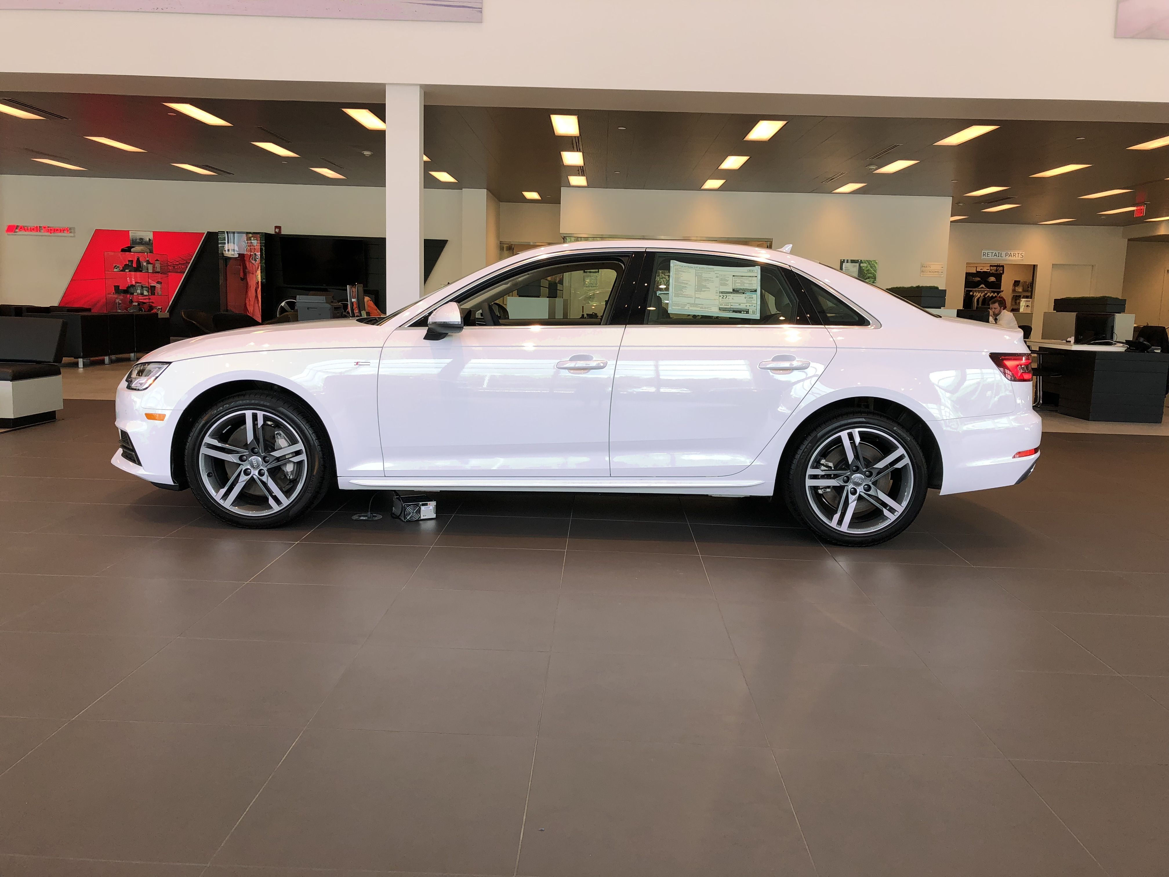 Wallpaper #Hn3x844Bnwiau_P6aQ5i50 Full Side View View of Ibis White Audi A4 Located at Audi of