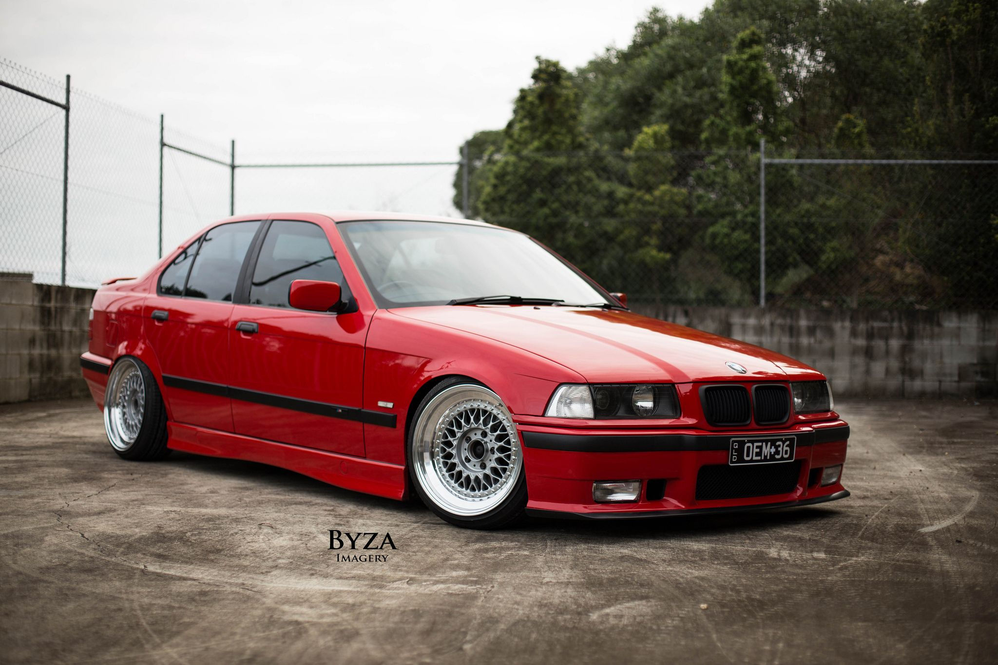 Wallpaper #z2rNMpMBqTKJtJWhSzsW305 Red BMW E36 Sedan with Classic Bbs Rs Wheels