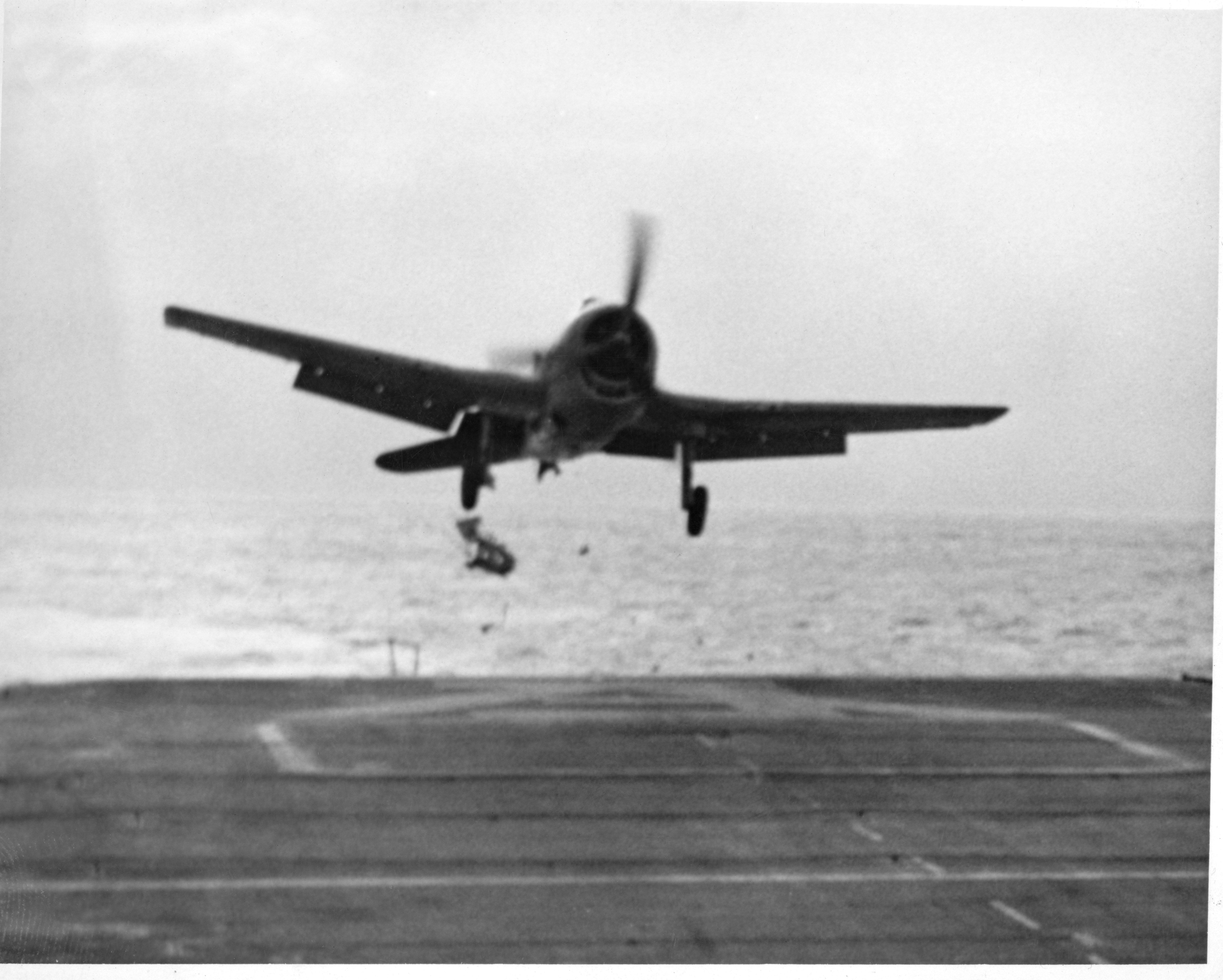 Wallpaper #BZ-aWJMBcUVgGJNo97Ey391 Badly Damaged Hellcat Landing on Hms Emperor Scanned from Personal