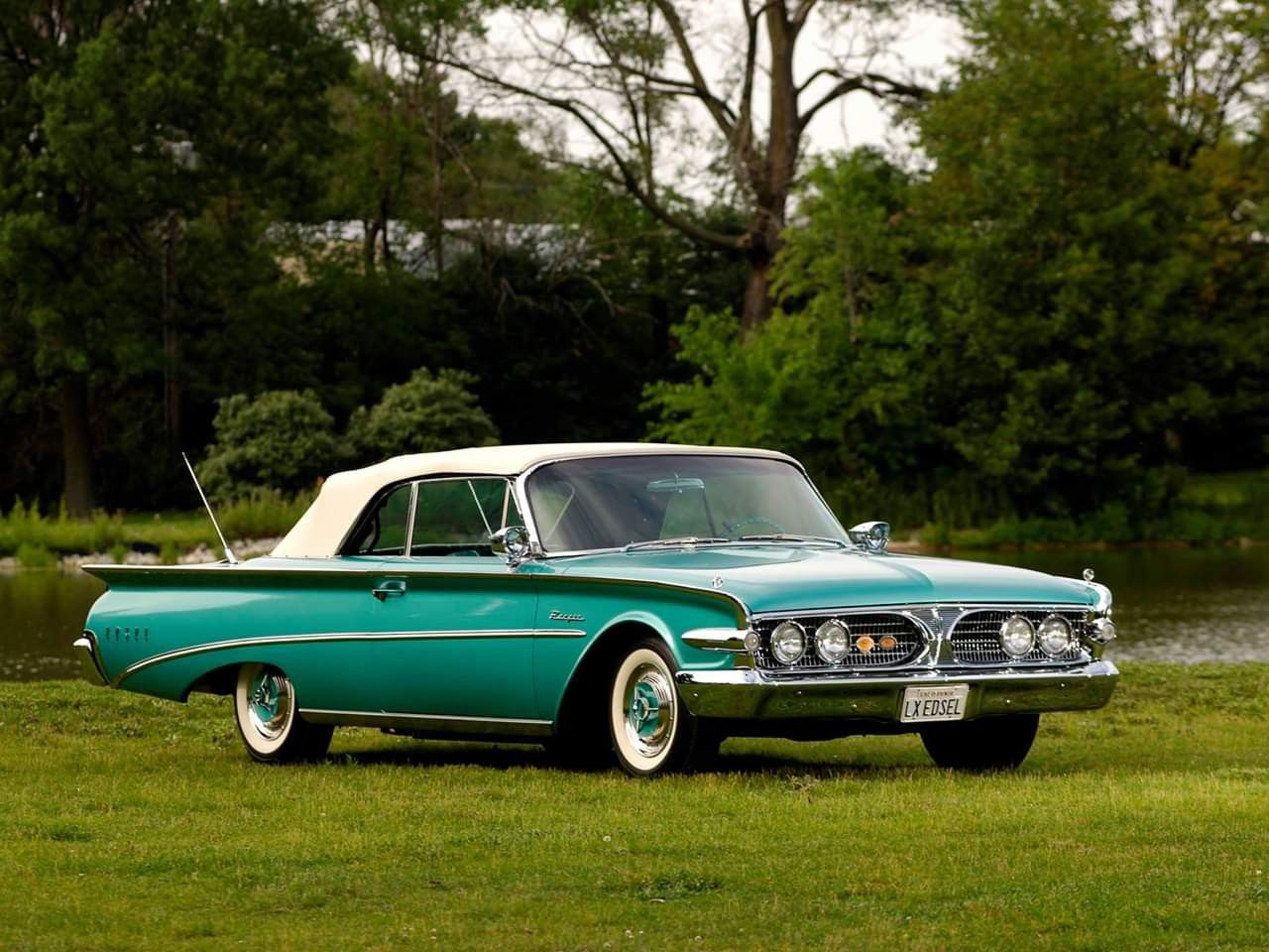 Wallpaper #_3MOho4BFI5NbQksfx5p36 A Classic 1959 Edsel Convertible Parked on a Grassy Field Near a Lake