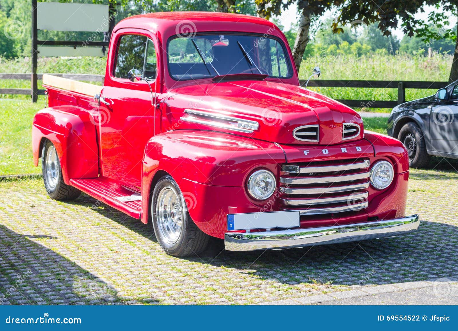 Wallpaper #7p2AM5MBgczKmuyaQfR_16 An Old Renovated Red Ford Vintage Pickup in a Parking Lot Editorial