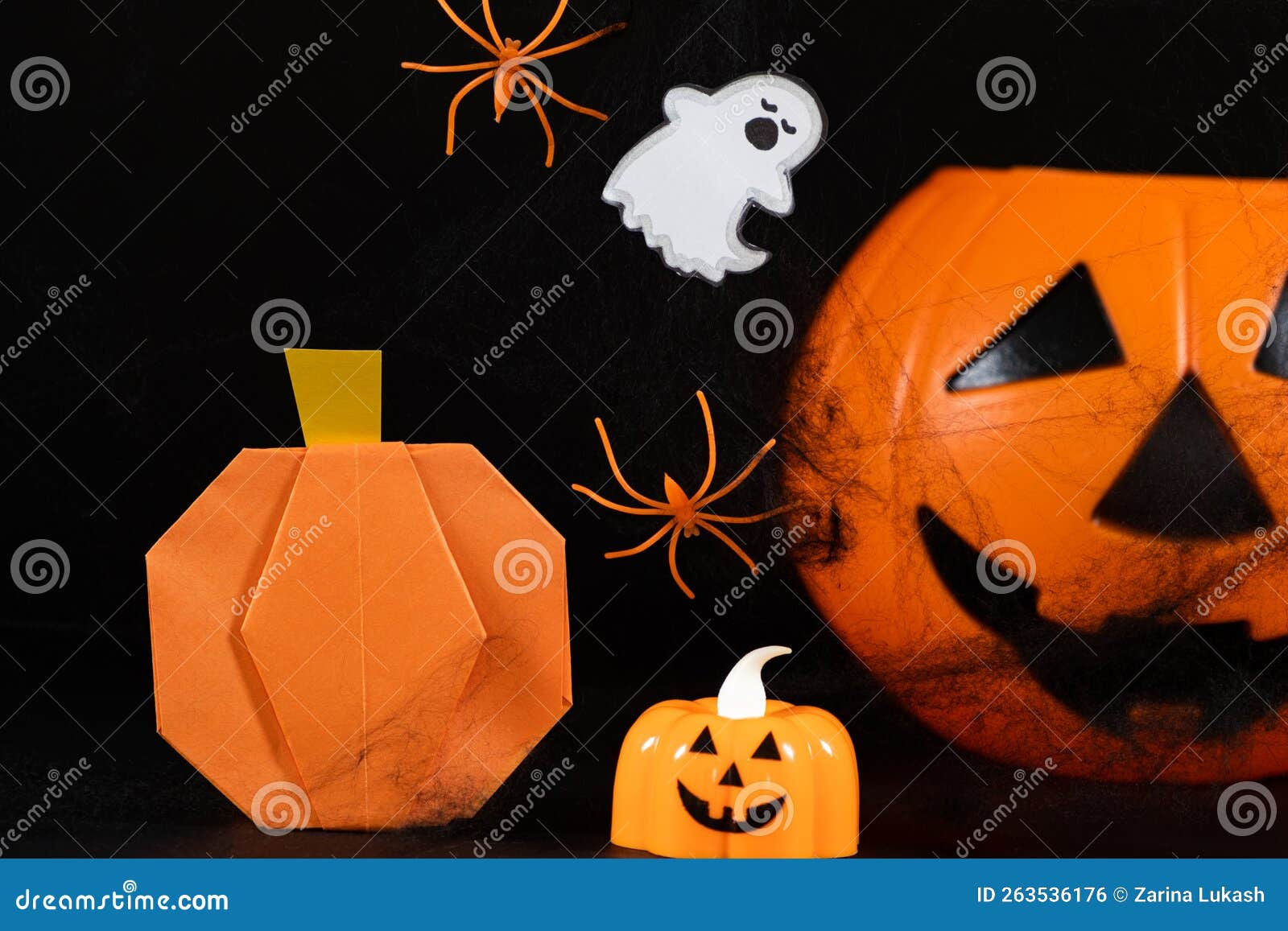 Wallpaper #MPSwOZMBKFX8bn3r33ez430 Orange Pumpkins a Ghost Spiders and Spider Webs on a Black Background