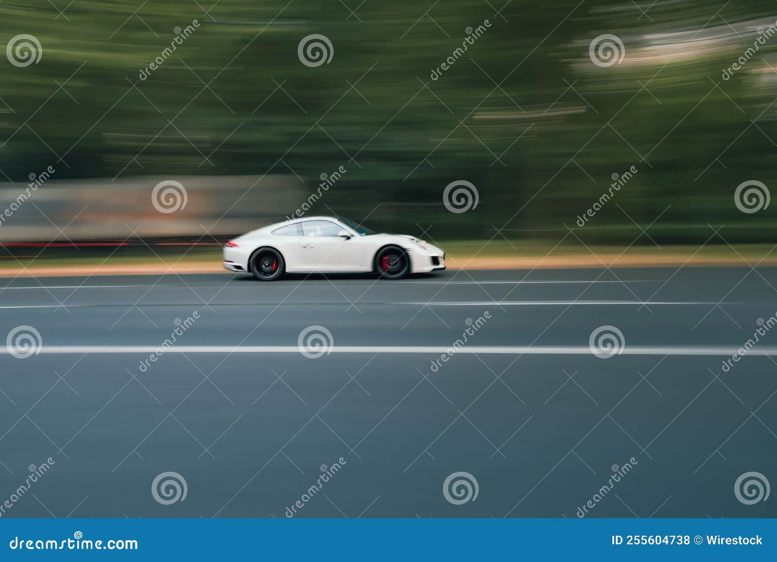 Wallpaper #GBphUJMB1yWOL4qgb4B5142 Motion Blur Shot of a Car Driving Fast in a Road Stock Photo Image of