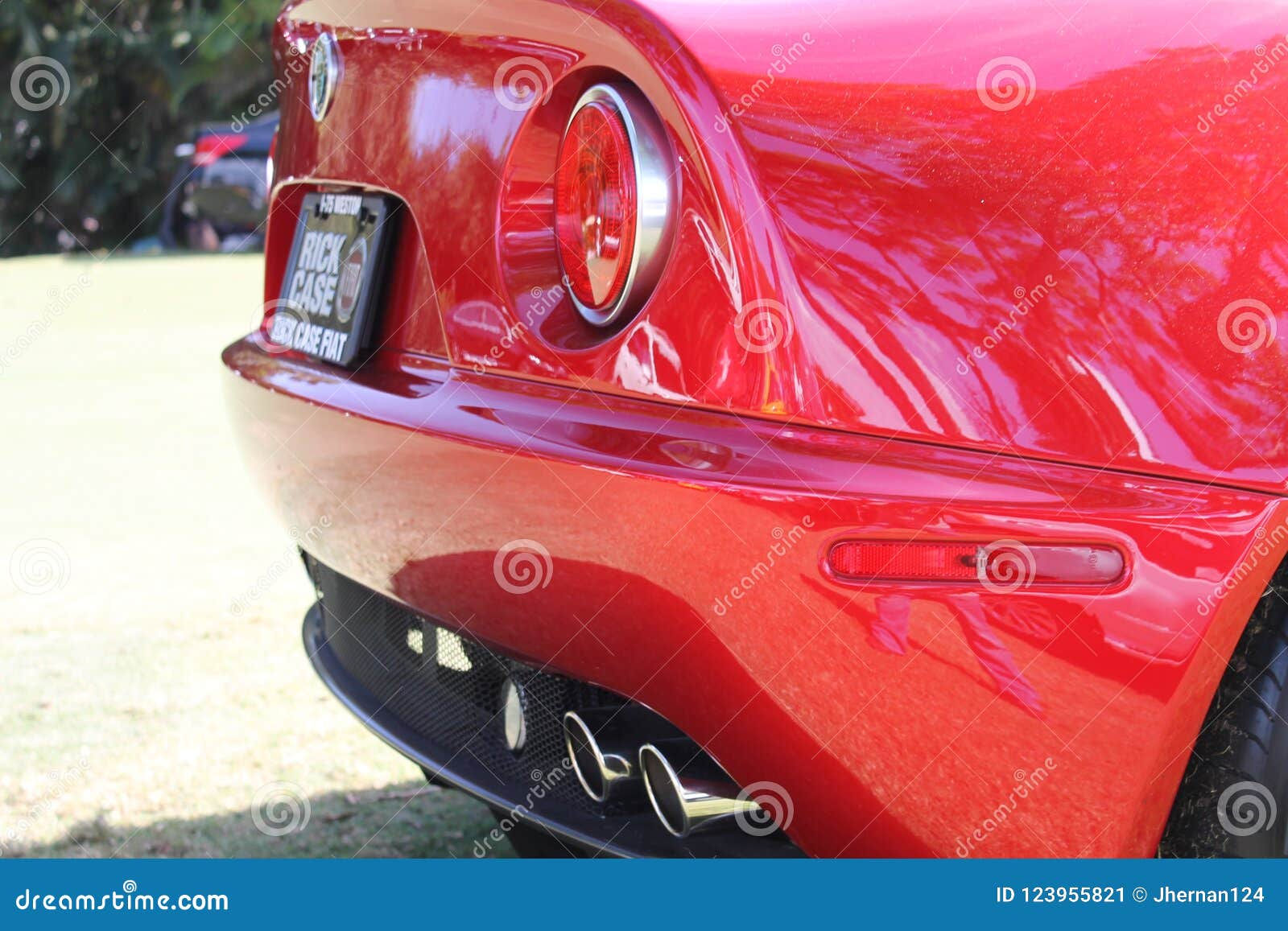 Wallpaper #NGcu_JIBSpphPi3-_JdS281 Modern Classic Italian Sports Car Rear Side Closeup Editorial Photo