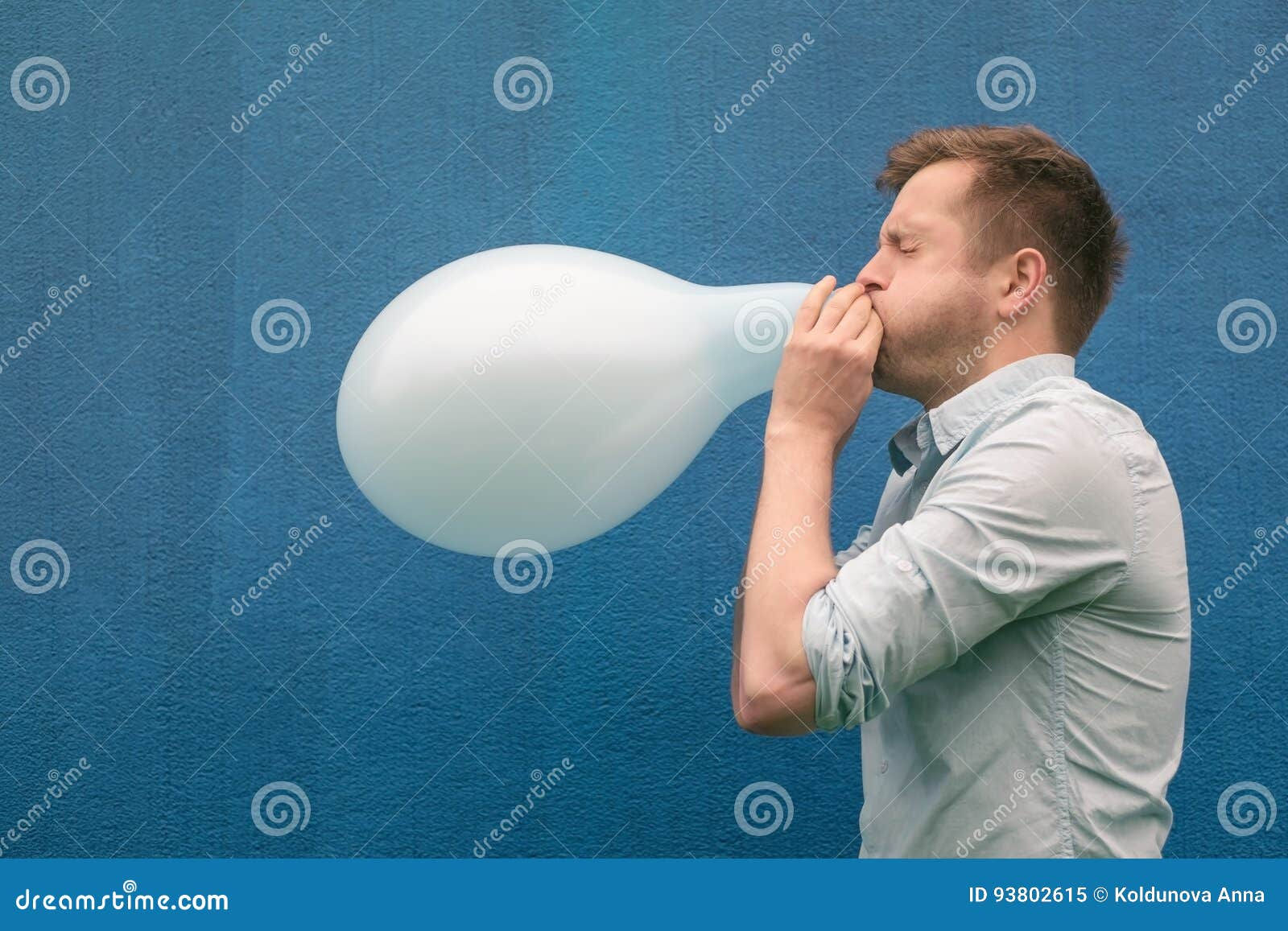 Wallpaper #JBVKNpMB-CQNECa2ESf_70 Man Blowing Up Balloon on Blue Background Stock Photo Cartoondealer