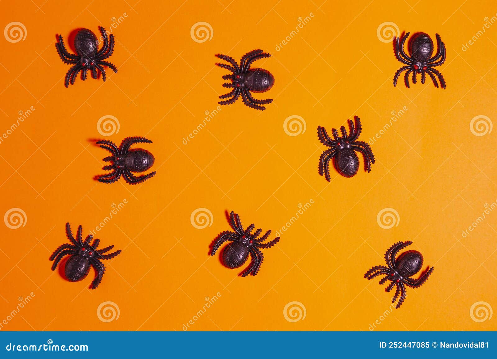 Wallpaper #HfQqOpMBKFX8bn3rhHgw263 Many Plastic Spiders on Orange Background Stock Image Image of