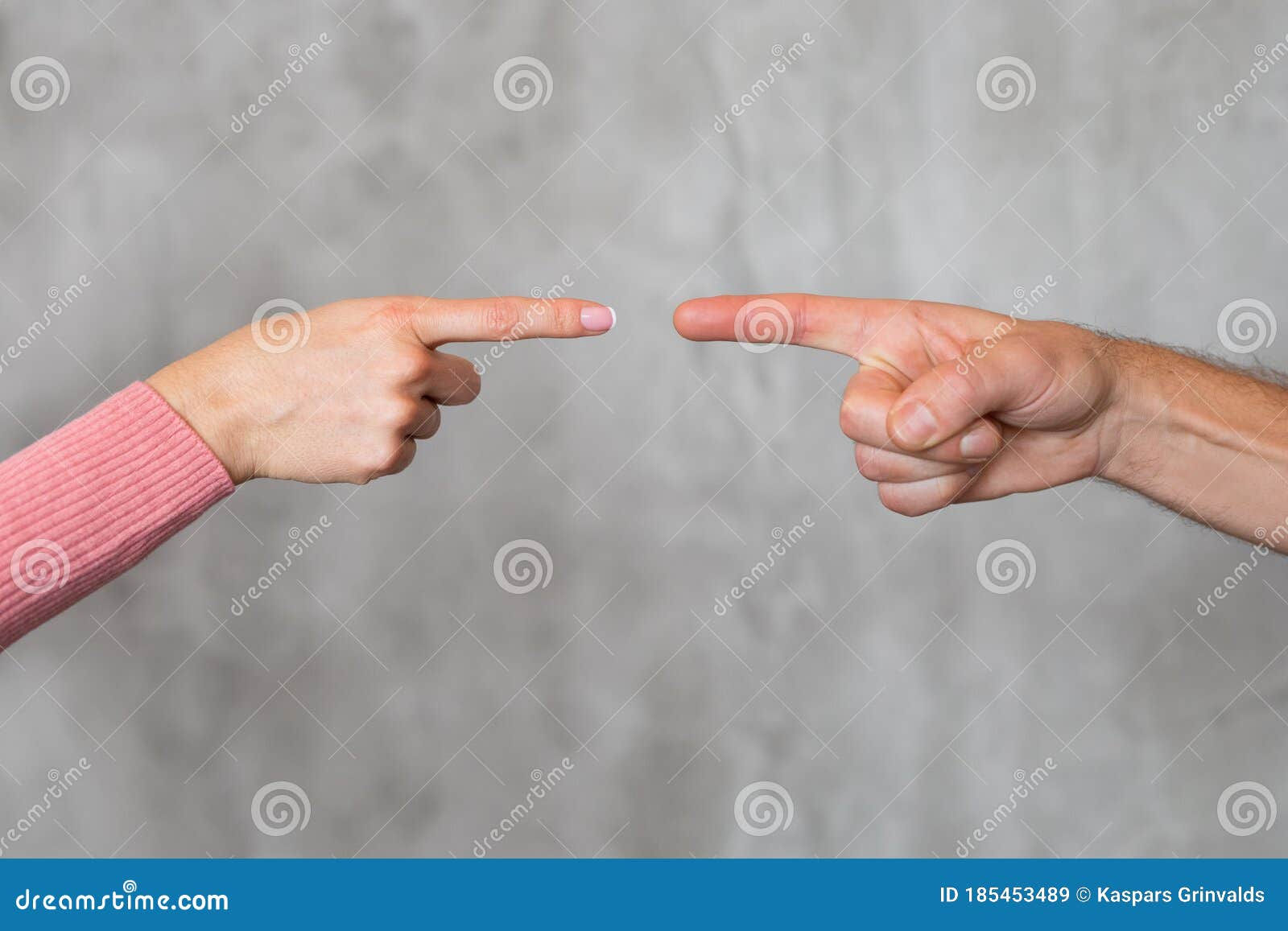 Wallpaper #1Gc0CJMBSpphPi3-gckF63 Man and Womans Fingers Pointing at Each Other Stock Image Image of
