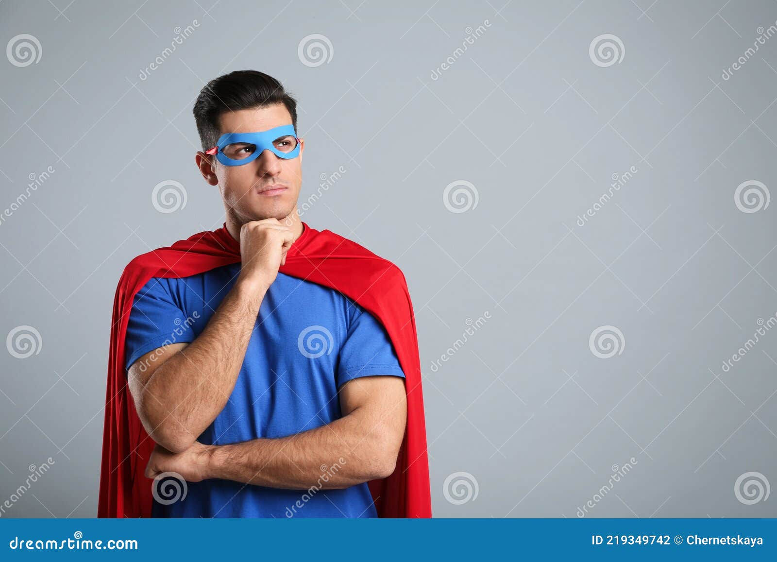 Wallpaper #YWfCDJMBSpphPi3-L-BK52 Man Wearing Superhero Cape and Mask on Grey Background Space for Text