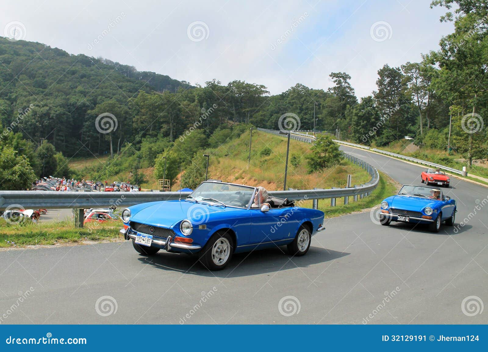 Wallpaper #NGcu_JIBSpphPi3-_JdS226 Three Classic Italian Sports Cars on Road Editorial Photo Image of