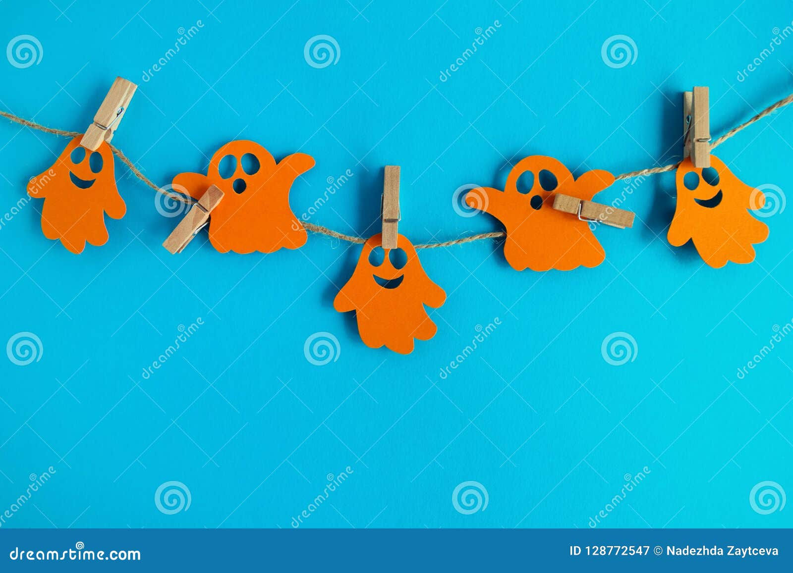 Wallpaper #lQMqZpMBpyOg8YnE0dqs178 Holiday Decorations for Halloween Orange Paper Ghosts Hanging on a