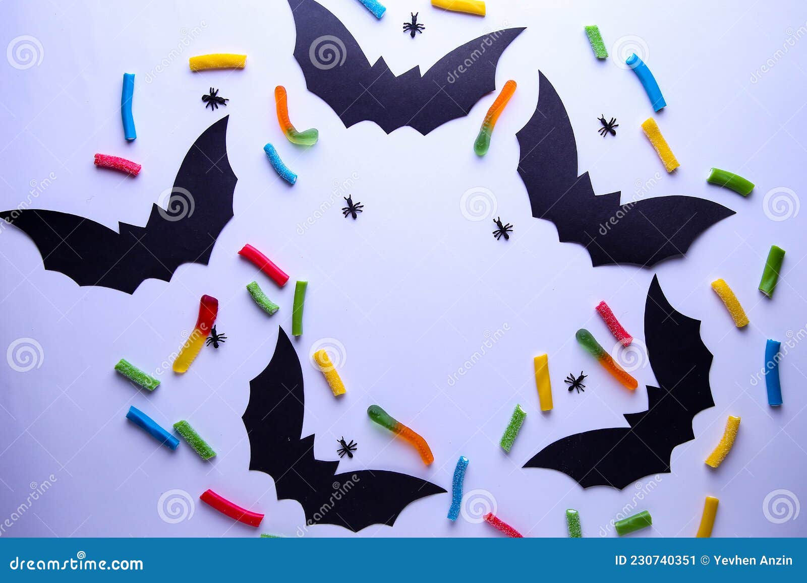 Wallpaper #lQMqZpMBpyOg8YnE0dqs72 Paper Halloween Decorations and Candy on White Background the Concept