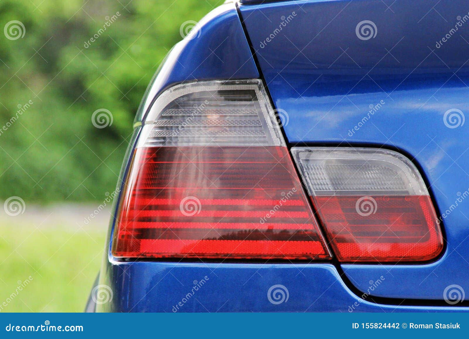Wallpaper #ZWeR_5IBSpphPi3-AaN-167 Part of a Blue Car Car Headlights Stock Photo Image of Auto
