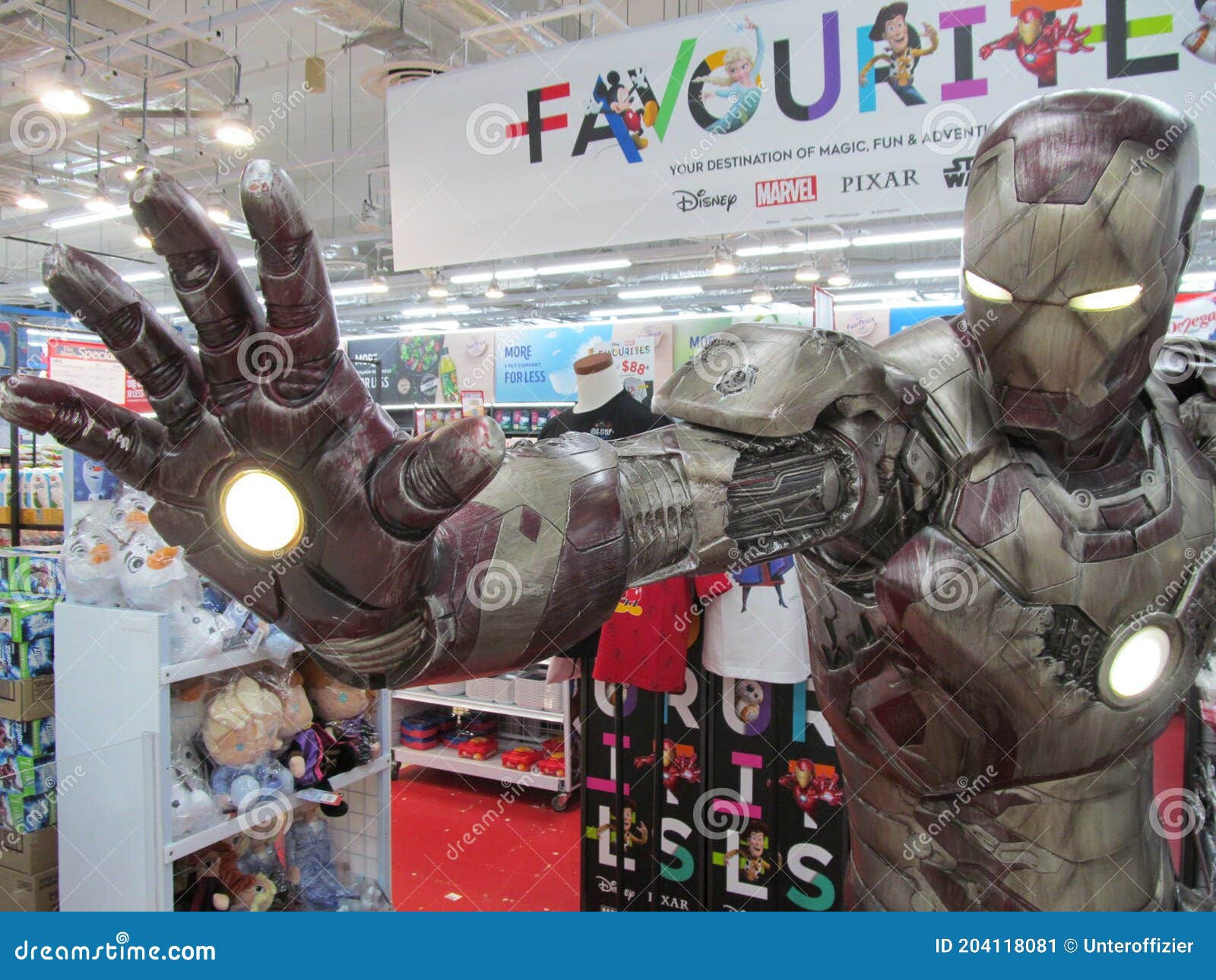 Wallpaper #YttdYpcBzF5tfotJZeX5193 A Life Size Marvel Hero Iron Man Figure Striking a Pose at a