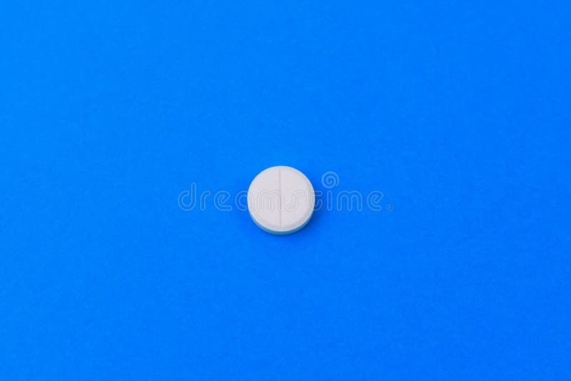 Wallpaper #v7hw2pIBJvJKYCmEjfFq489 White Medical Pill with a Score on a Classic Traditional Blue