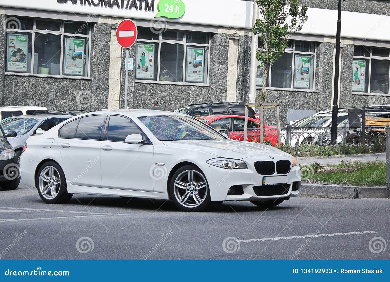 Wallpaper #v3fdJpMB-pgBXx60JaPB76 Ukraine Kiev March 5 2014 White BMW F10 in Motion Editorial Stock