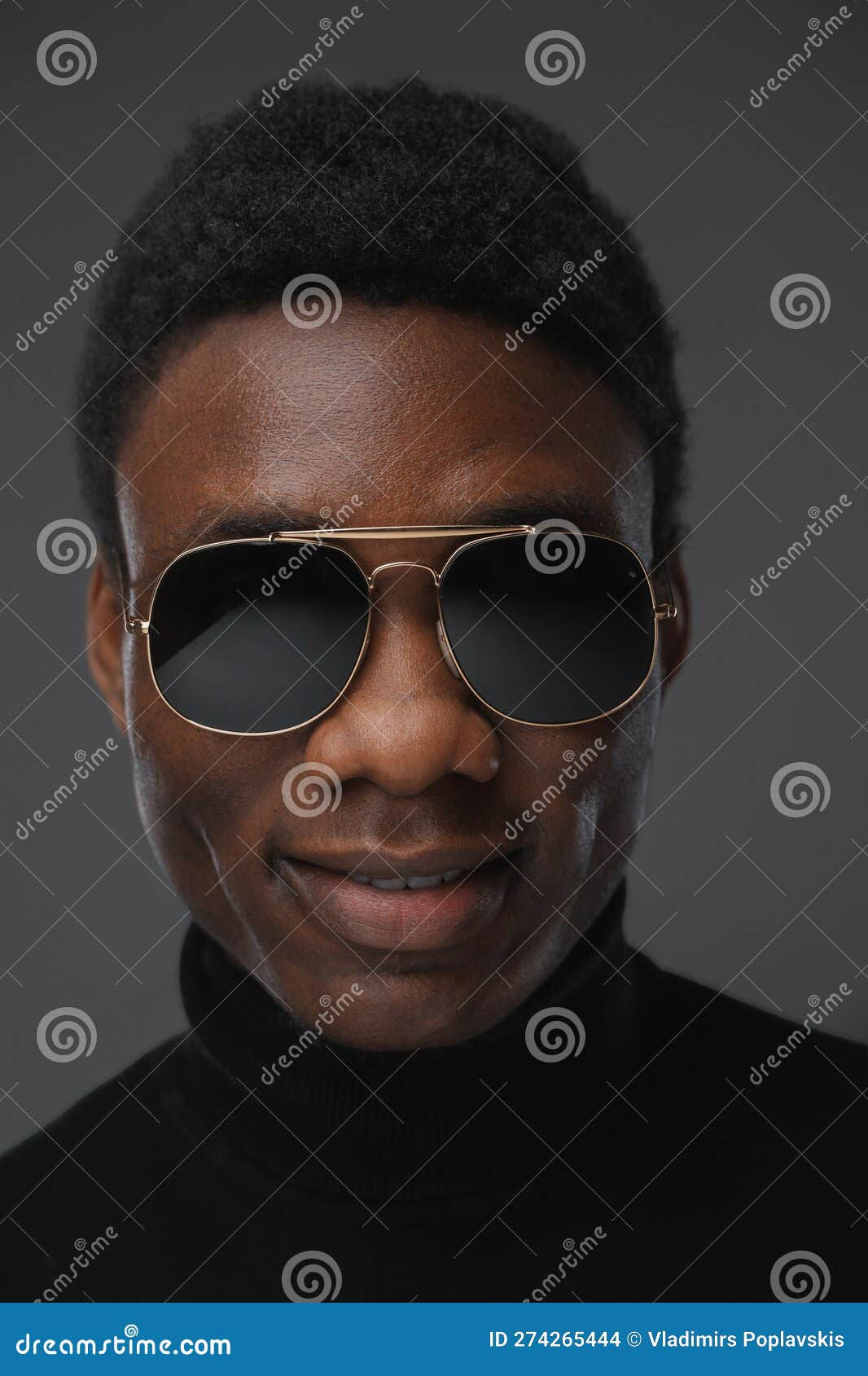 Wallpaper #C2gsJJMBSpphPi3-UzjF430 Smiling Black Man with Sunglasses Against Gray Background Stock Photo
