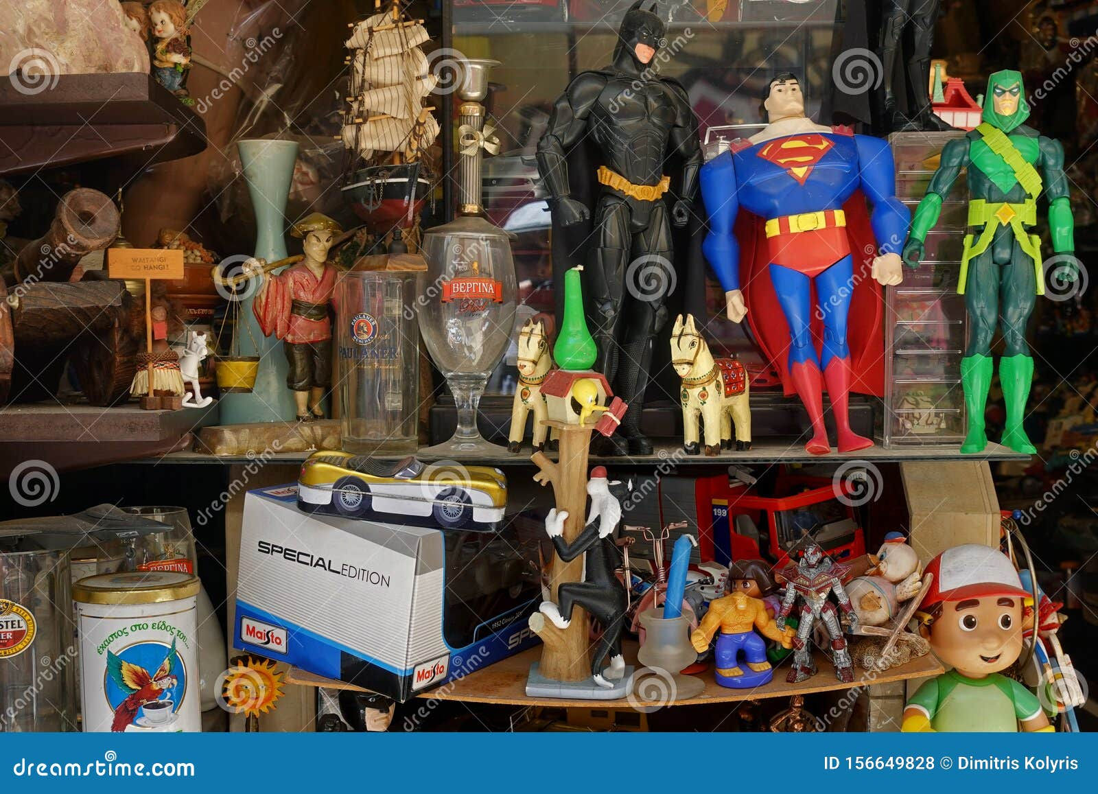 Wallpaper #Ce9iS5MBMN-XEVvVZDuM225 Superhero Action Figures at Antiques Store Editorial Stock Photo