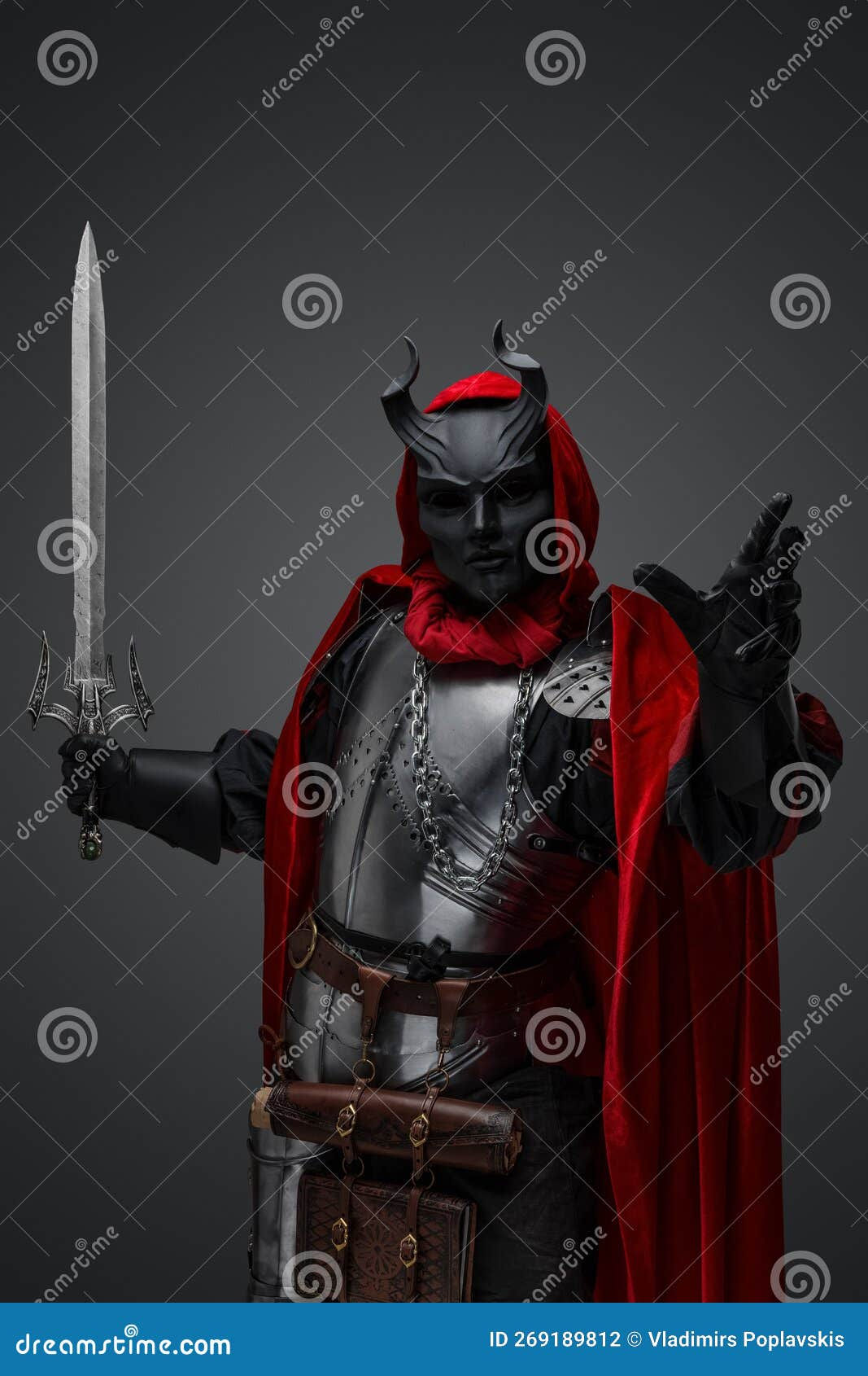 Wallpaper #uAMlZJMBpyOg8YnEhtaE38 Leader of Dark Cult with Sword and Black Mask Stock Photo Image of
