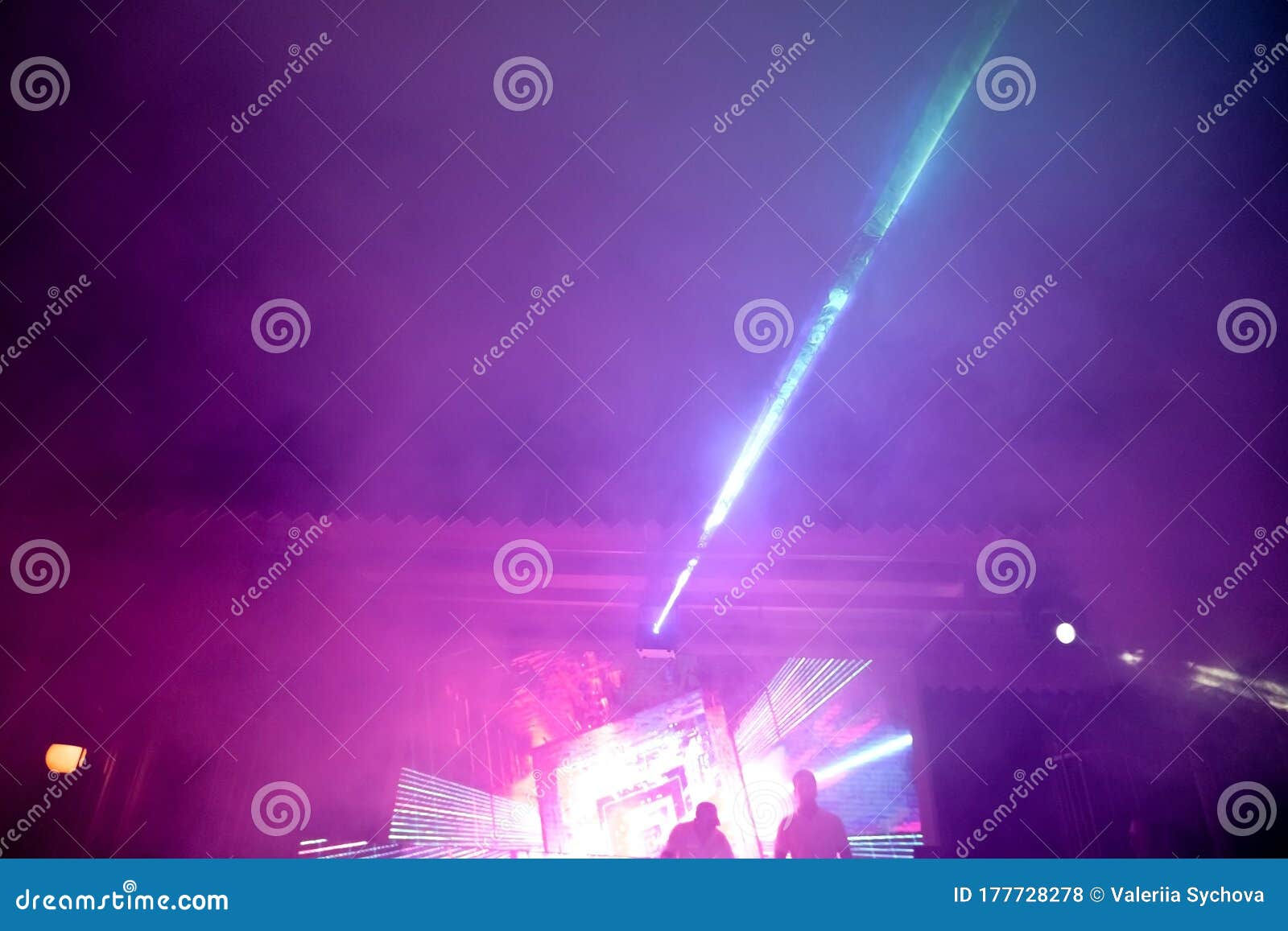 Wallpaper #32gqF5MBSpphPi3-sA2h61 Soft Focus Smoke at a Night Disco Vibrant Stage Neon Lights and