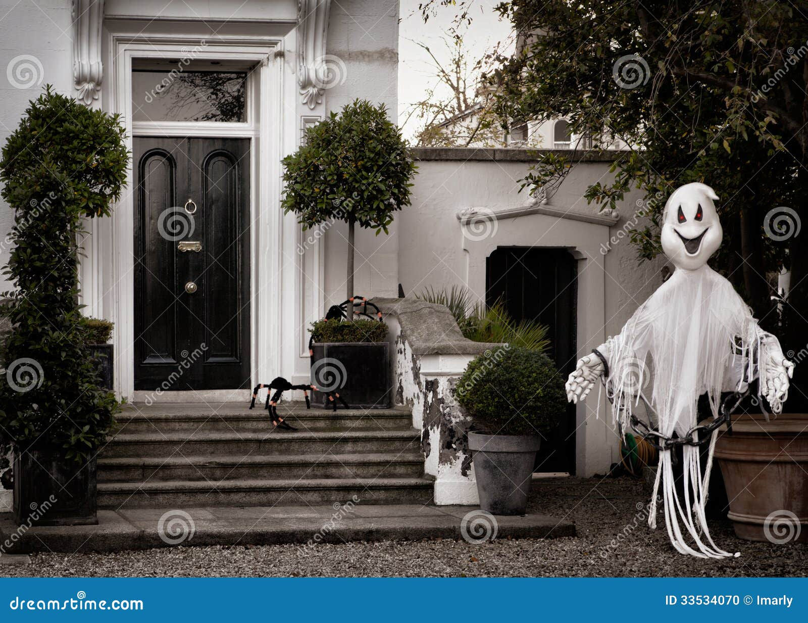 Wallpaper #GvSnOZMBKFX8bn3rXXez154 Front Garden Decoration for Halloween with Scary Ghost Stock Photo