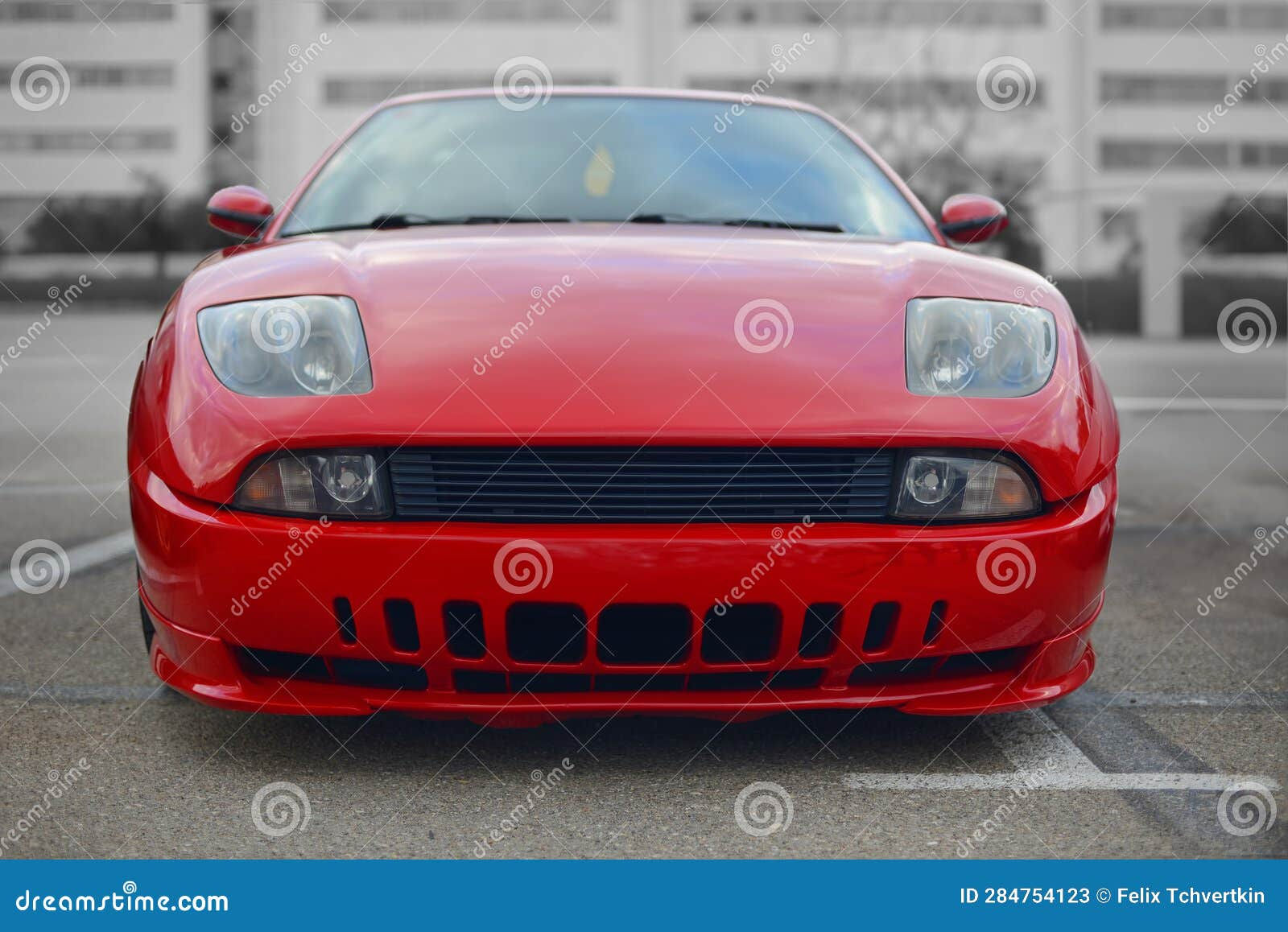 Wallpaper #NGcu_JIBSpphPi3-_JdS330 A Frontal Photo of an Red Italian Sport Car from the 90s Stock Image