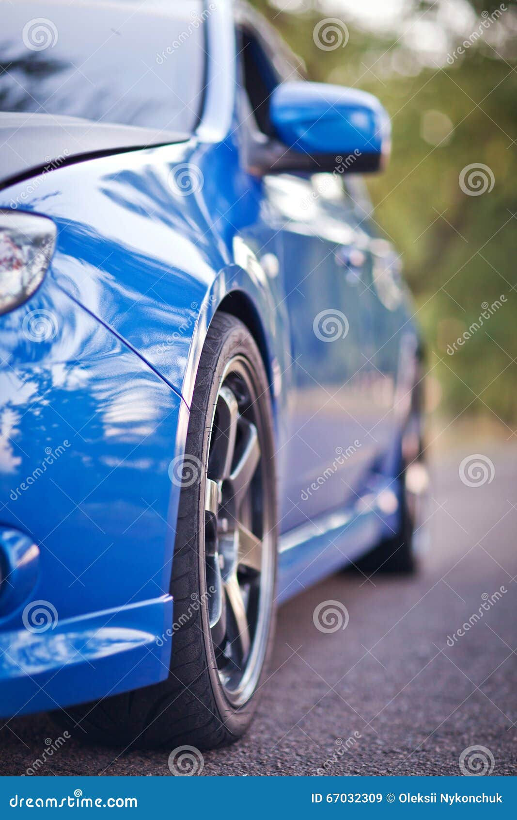 Wallpaper #kWidIpMBSpphPi3-uDN476 Front Side View of Blue Sport Car Stock Image Image of Racecar