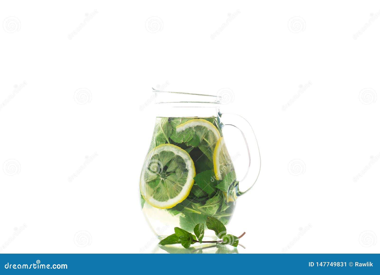 Wallpaper #4WcM6pIBSpphPi3-bkQ1258 Fresh Cold Lemonade with Lemons and Mint in a Carafe Isolated on White