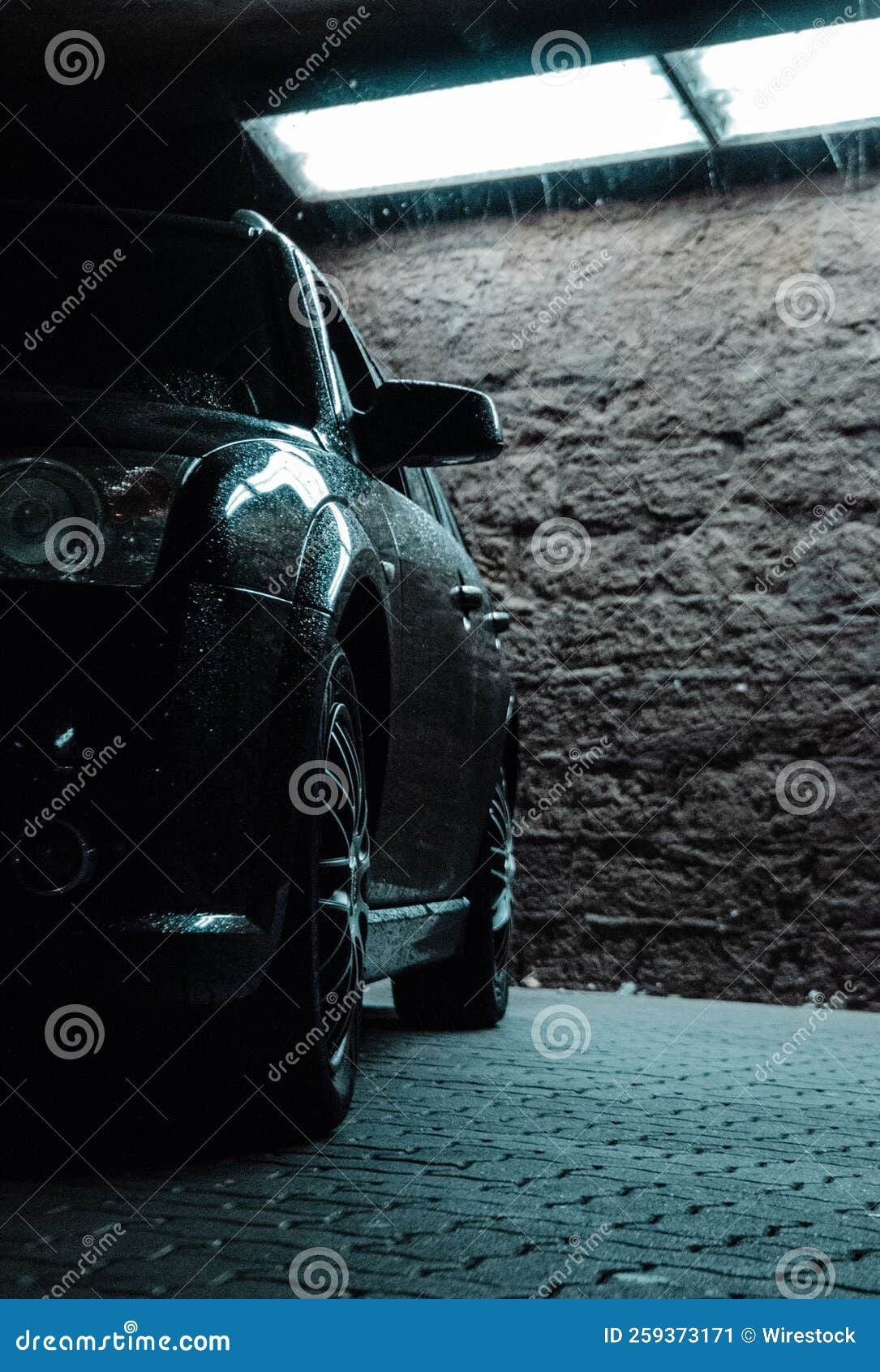 Wallpaper #QWd37pIBSpphPi3-ql0r382 Front View Shot of a Shiny Luxury Car Parked on Stone Floor with Stone