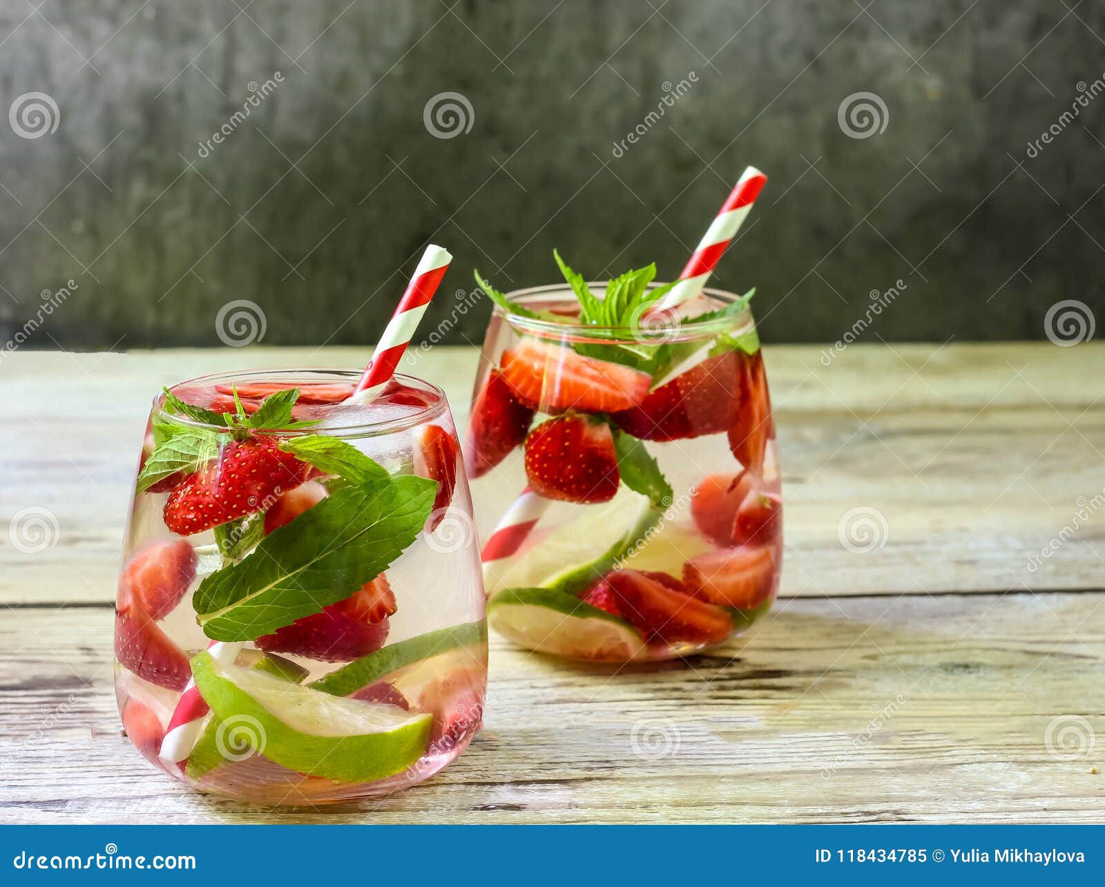 Wallpaper #GGfpAZMBSpphPi3-Wa1b192 Fresh Lemonade with Strawberries Lime and Mint on a Wooden Background
