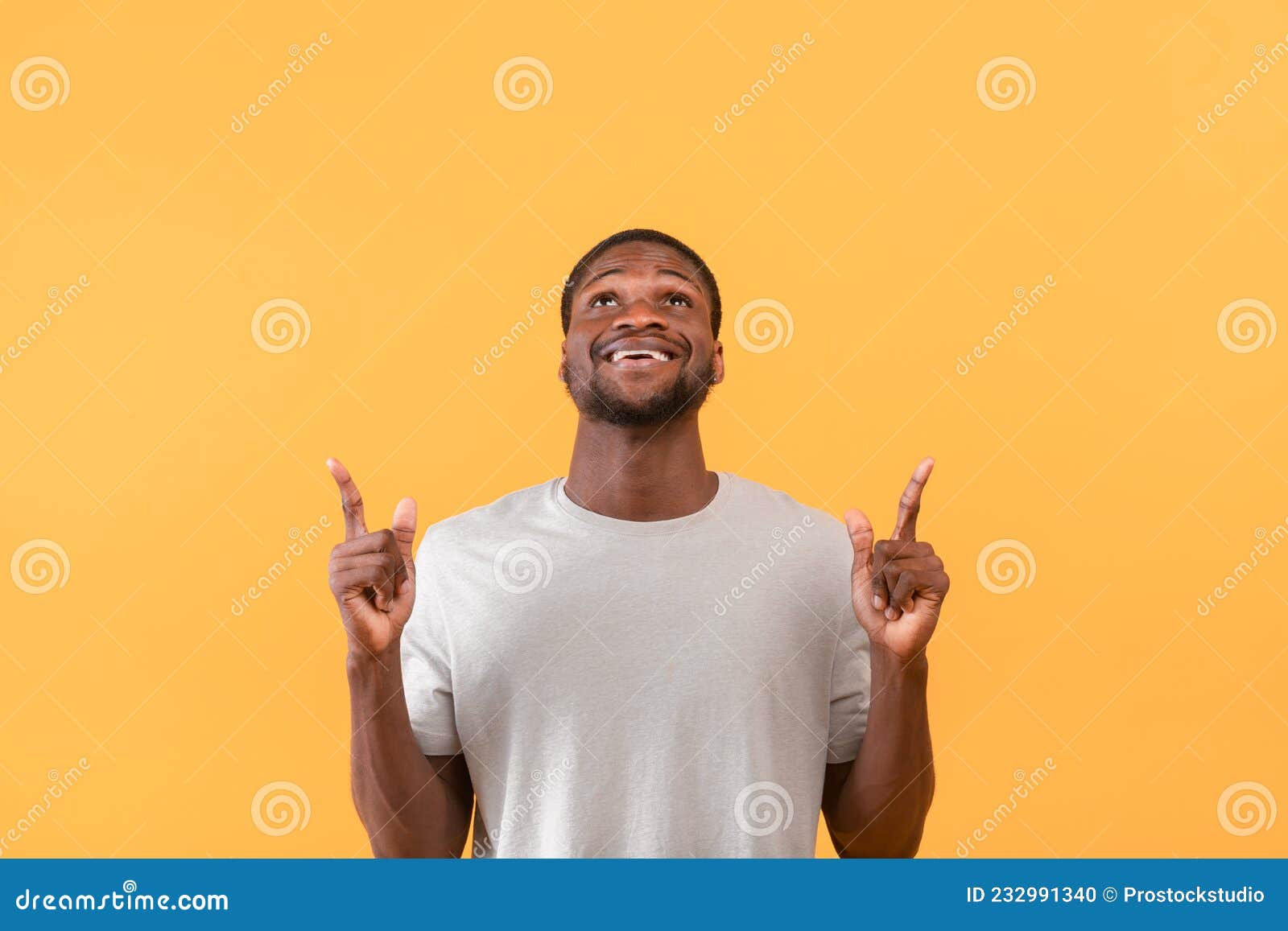 Wallpaper #IWf6_JIBSpphPi3-lZoB25 Look Here Positive Black Man Pointing Up at Free Space Above His Head