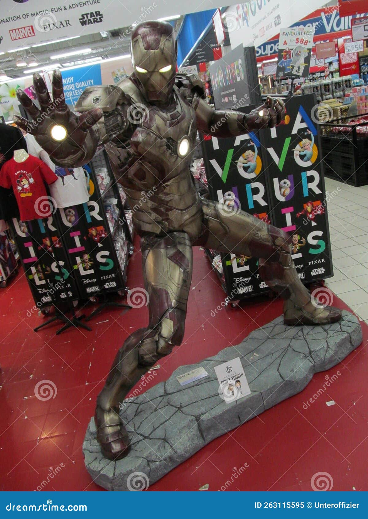 Wallpaper #YttdYpcBzF5tfotJZeX5146 A Life Size Marvel Hero Iron Man Figure Striking a Pose at a