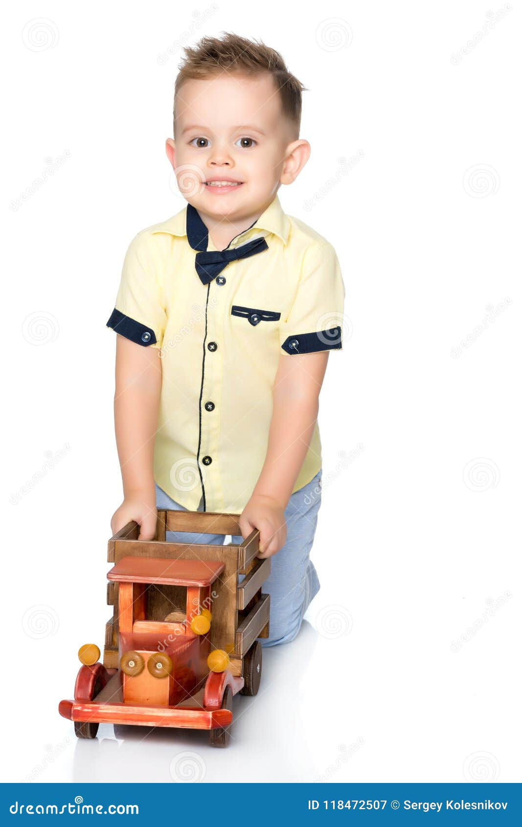 Wallpaper #i33h8I4Bnwiau_P60gfy53 A Little Boy is Playing with a Toy Car Stock Image Image of Driving