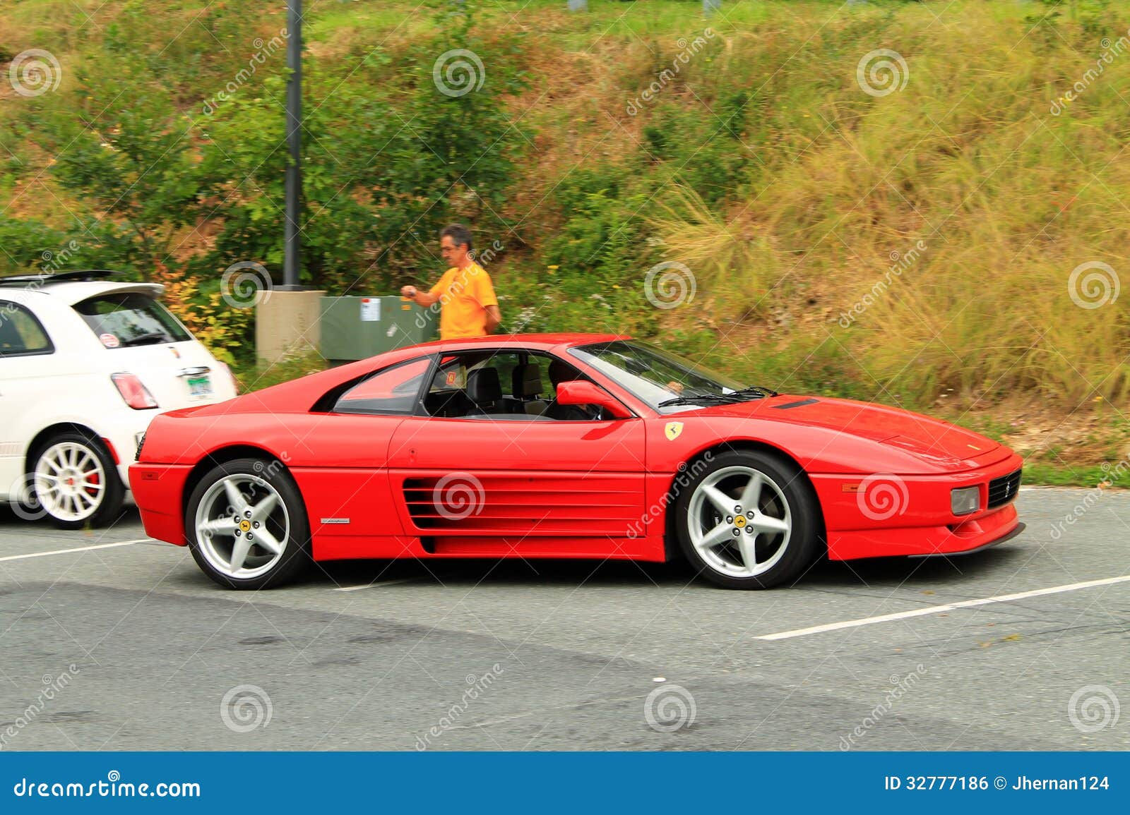 Wallpaper #kWidIpMBSpphPi3-uDN488 Red Italian Sports Car Front Side View Editorial Photo Image of