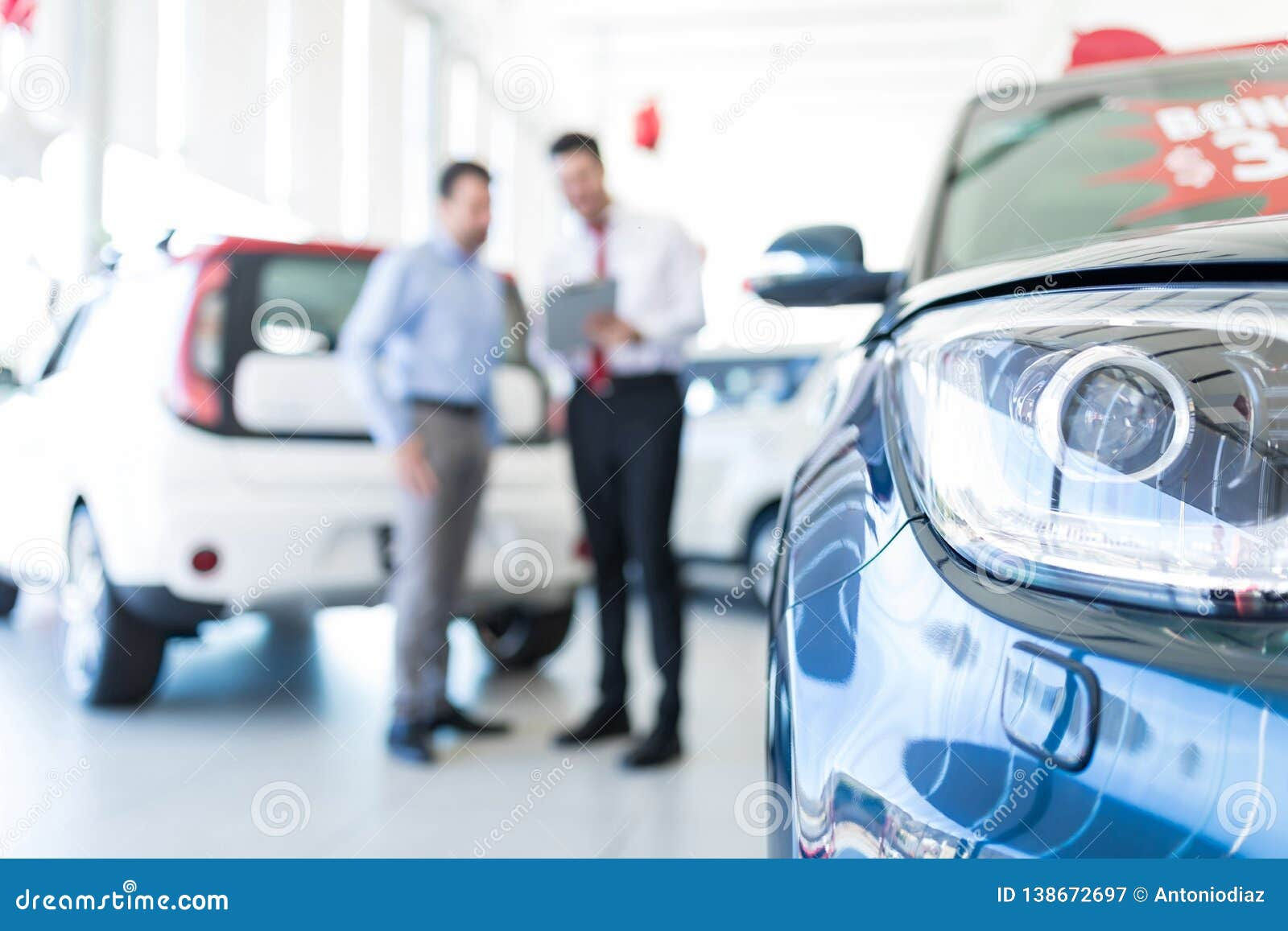 Wallpaper #JR3OK5MBlOZrFDOkKslm74 Display of Luxury Car in Showroom Stock Image Image of Customer Blur