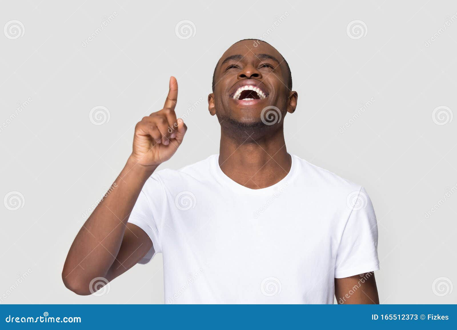Wallpaper #IWf6_JIBSpphPi3-lZoB44 Excited Laughing African American Man Pointing Finger Up Stock Image