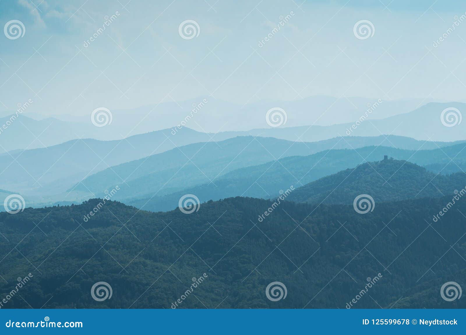 Wallpaper #x--qS5MBMN-XEVvVnztn231 Abstract Blue Landscape with Silhouettes of Misty Mountains Stock Photo