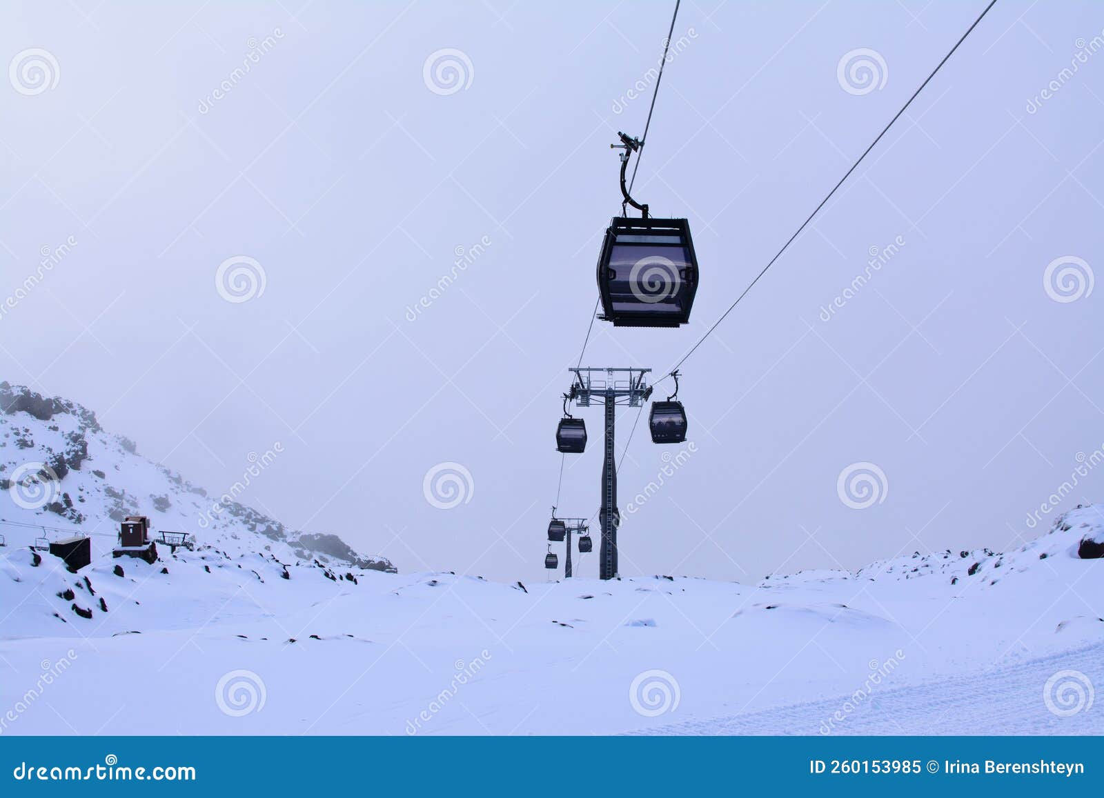 Wallpaper #1jVpkpcBk_lpvpalRJR8160 Cable Cars Going Up and Down Snow Blanketed Slopes of the Mountain