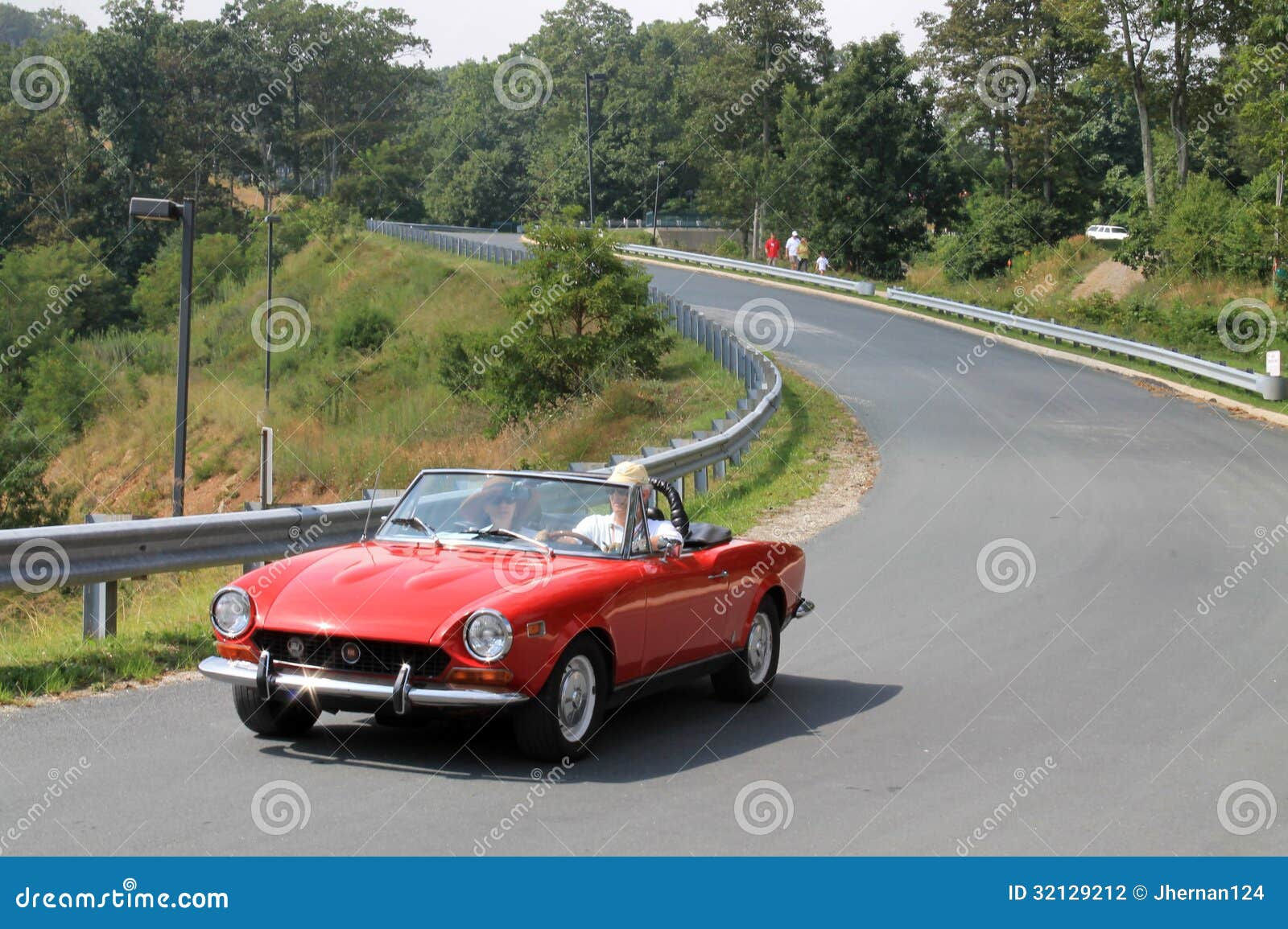 Wallpaper #NGcu_JIBSpphPi3-_JdS237 Closer Up Classic Little Red Italian Sports Car on Downhill Road