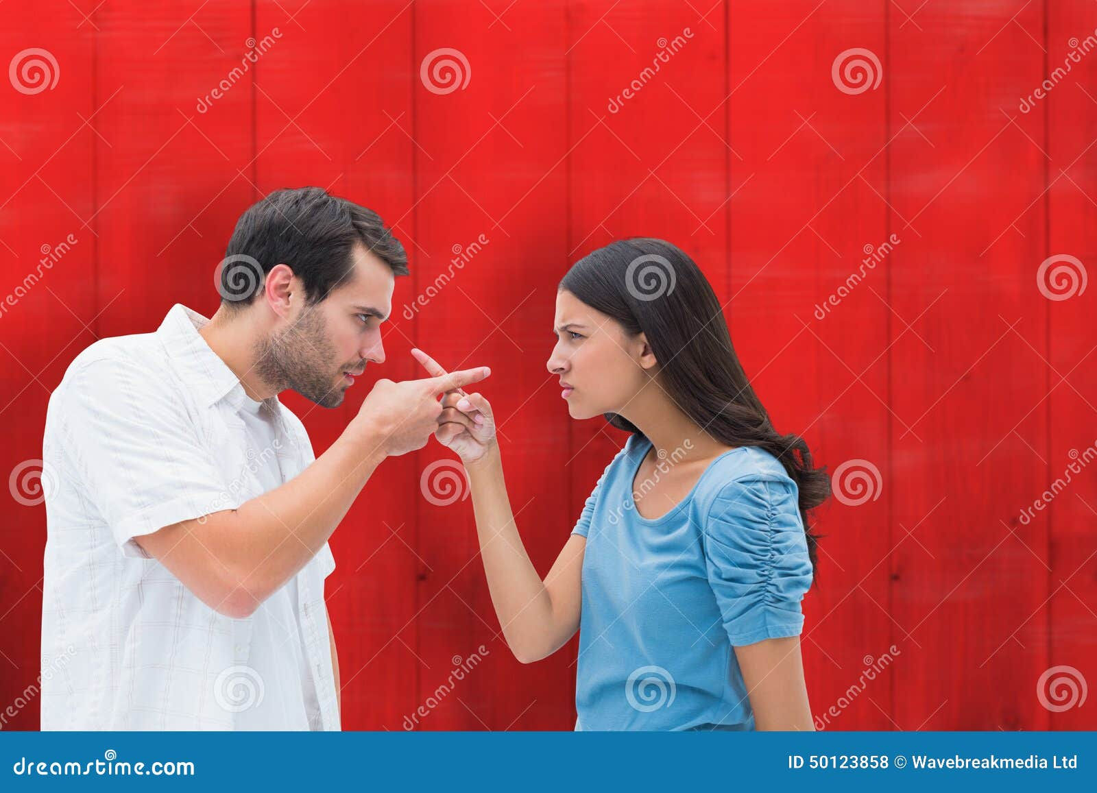 Wallpaper #1Gc0CJMBSpphPi3-gckF74 Composite Image of Angry Couple Pointing at Each Other Stock Photo