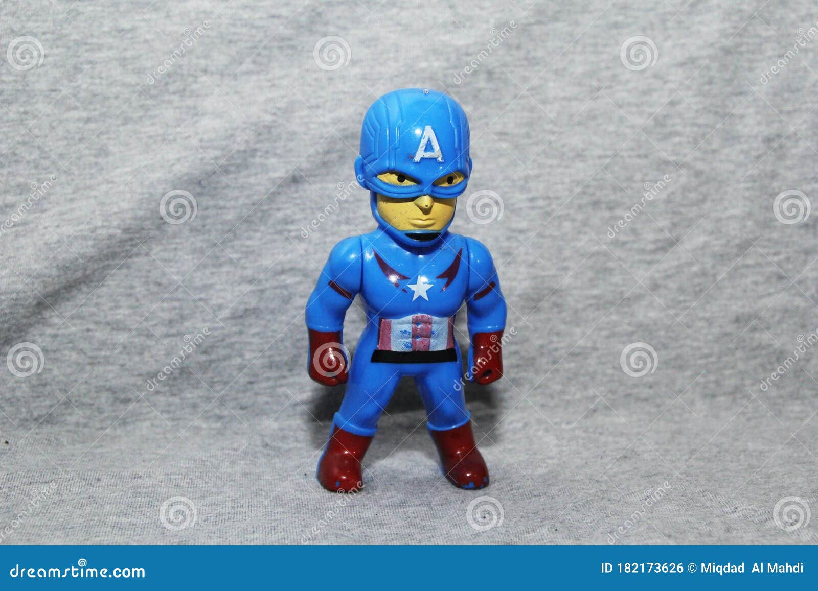 Wallpaper #zWdQ-ZIBSpphPi3-lozD292 Captain Americas Toys Appear in Front of a Gray Background Editorial