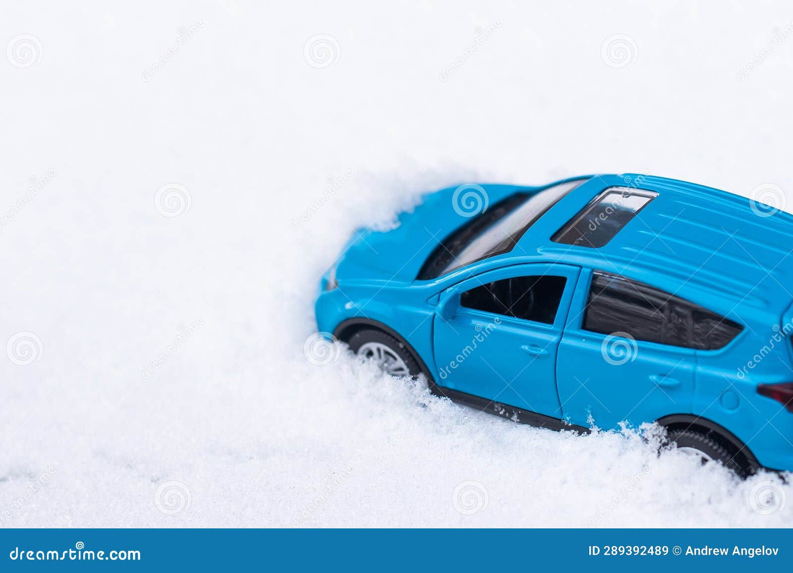 Wallpaper #0GfJ9pIBSpphPi3-OYTp210 Close Up View of Blue Toy Car with Snow Stock Image Image of Rail