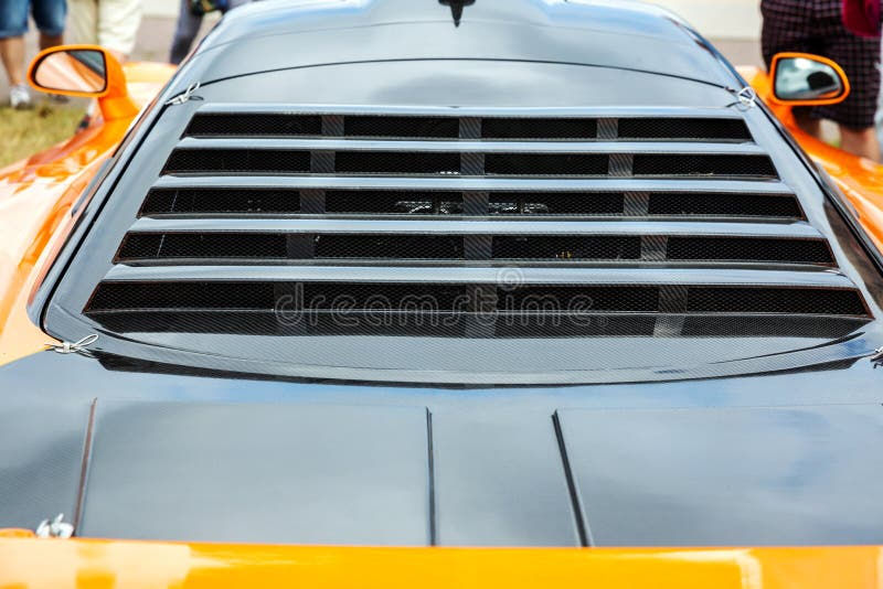 Wallpaper #O7n53ZIBJvJKYCmEmAPR146 Rear View of Window of Modern Sports Car Stock Image Image of Orange