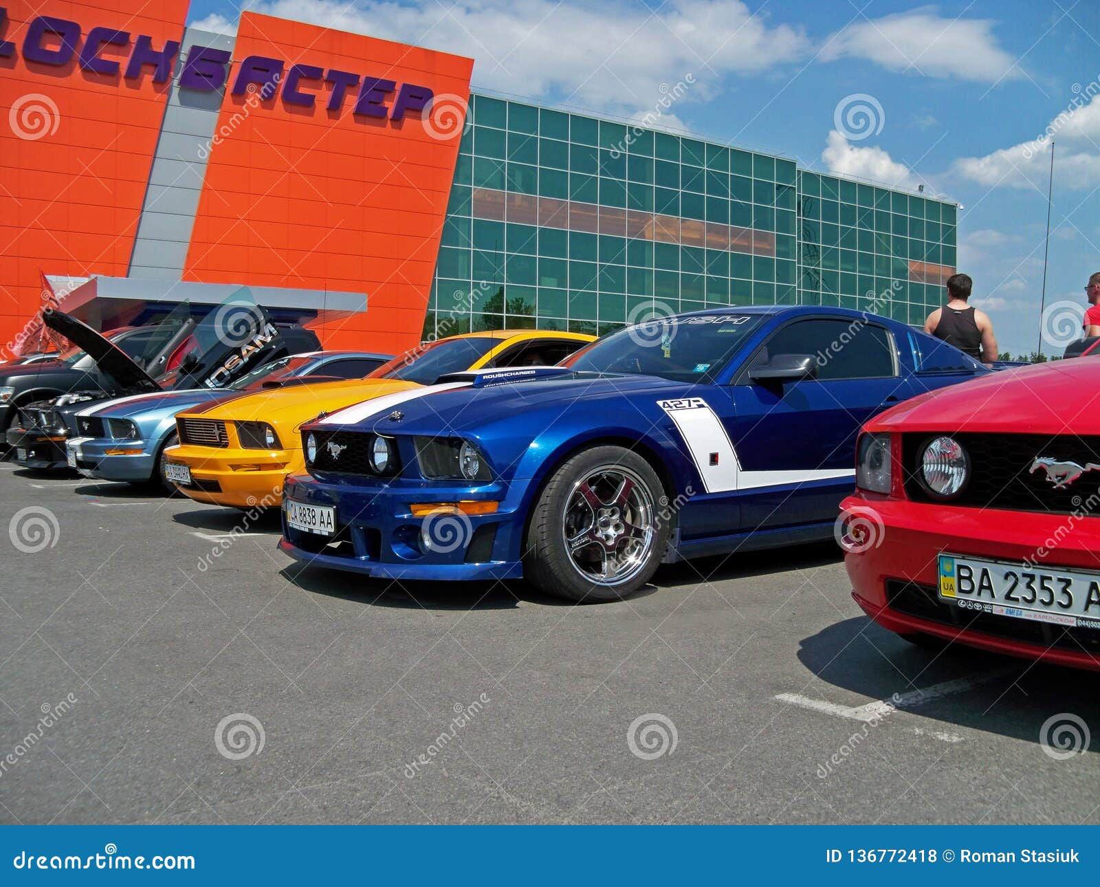 Wallpaper #LJ9kWZMBcUVgGJNoqrJ0318 Kiev Ukraine 22 May 2011 Four Ford Mustangs Red Blue Yellow