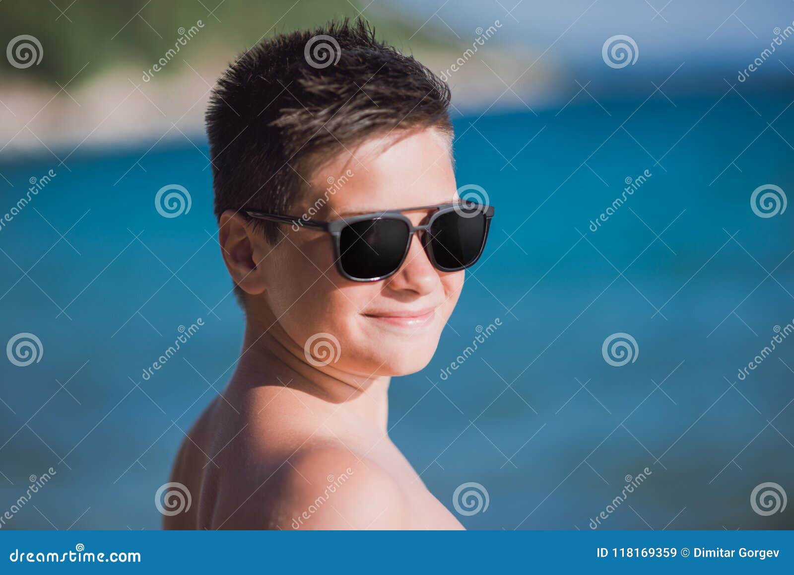 Wallpaper #oPRpOpMBKFX8bn3ru3gp49 Young Kid with Sunglasses Posing on the Beach Stock Image Image of