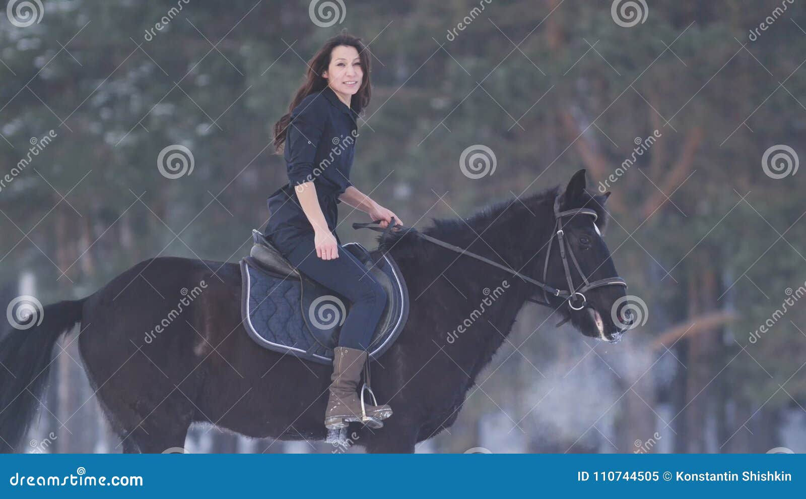 Wallpaper #Rmc1DJMBSpphPi3-Bt0d58 Beautiful Longhaired Woman Riding a Black Horse Through the Snow in the