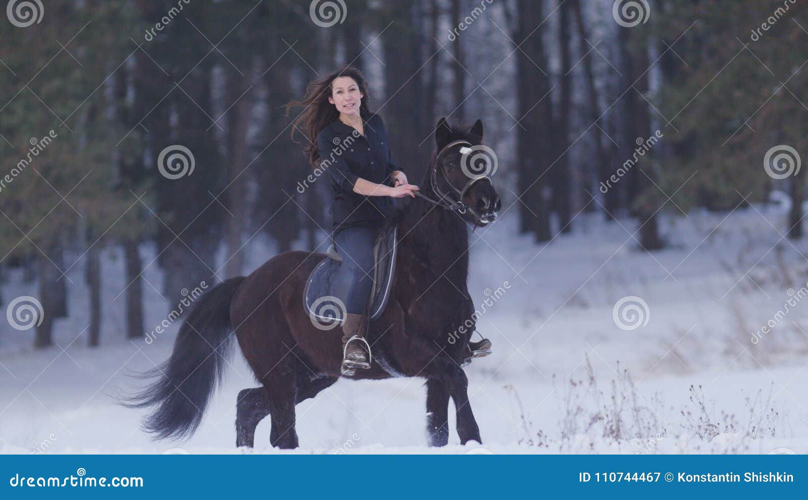 Wallpaper #Rmc1DJMBSpphPi3-Bt0d43 Beautiful Longhaired Woman Riding a Black Horse Through the Snow in the