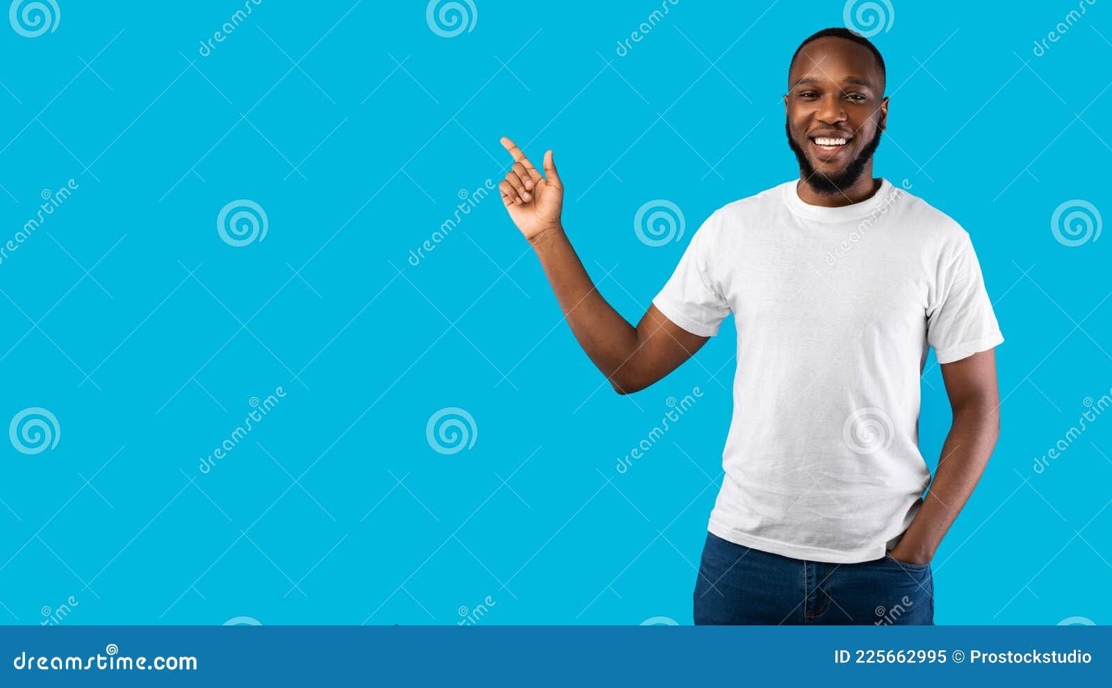 Wallpaper #IWf6_JIBSpphPi3-lZoB165 Black Man Pointing Finger Aside Smiling to Camera Blue Background