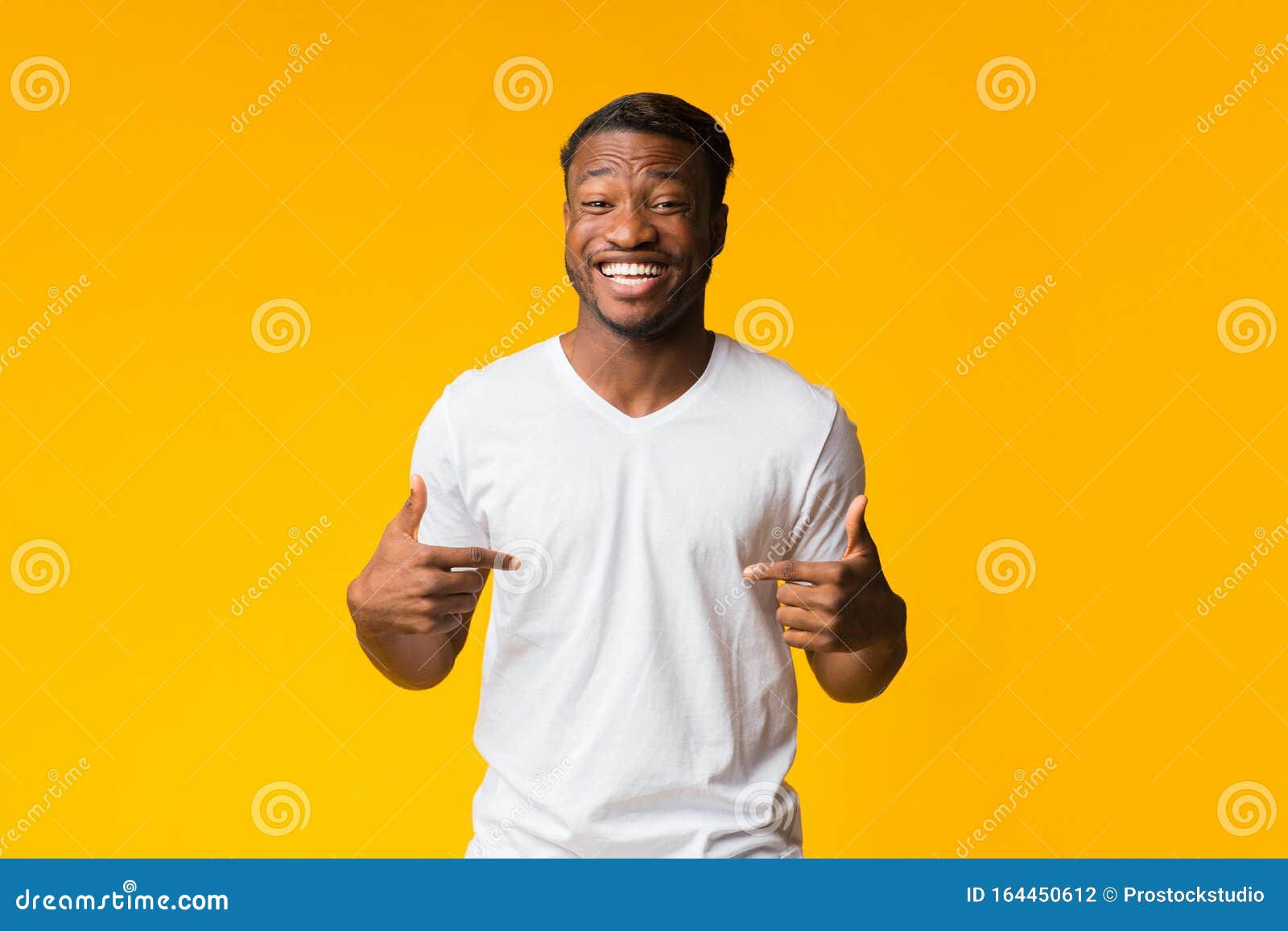 Wallpaper #IWf6_JIBSpphPi3-lZoB222 Black Man Pointing Fingers at Himself Smiling Over Yellow Background