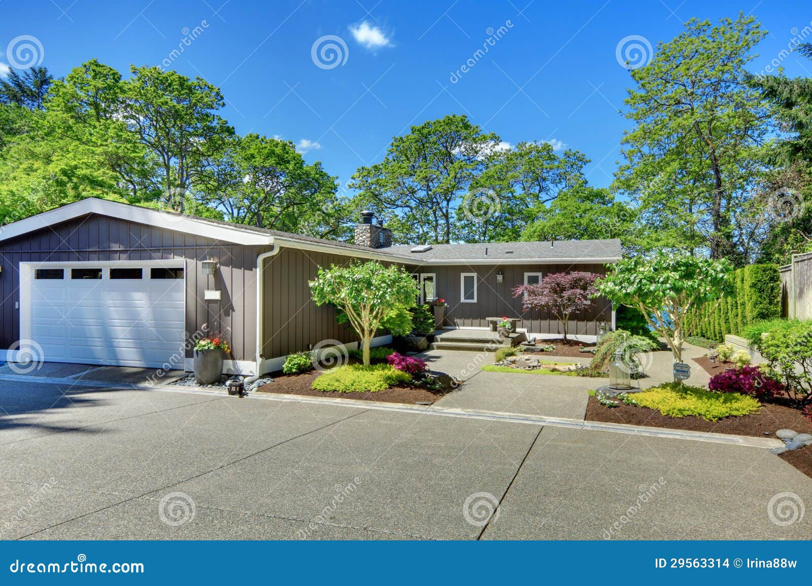 Wallpaper #42iHFpMBSpphPi3-IQts59 Beautiful Home with Garage Lake View and Large Front Yard Stock Photo