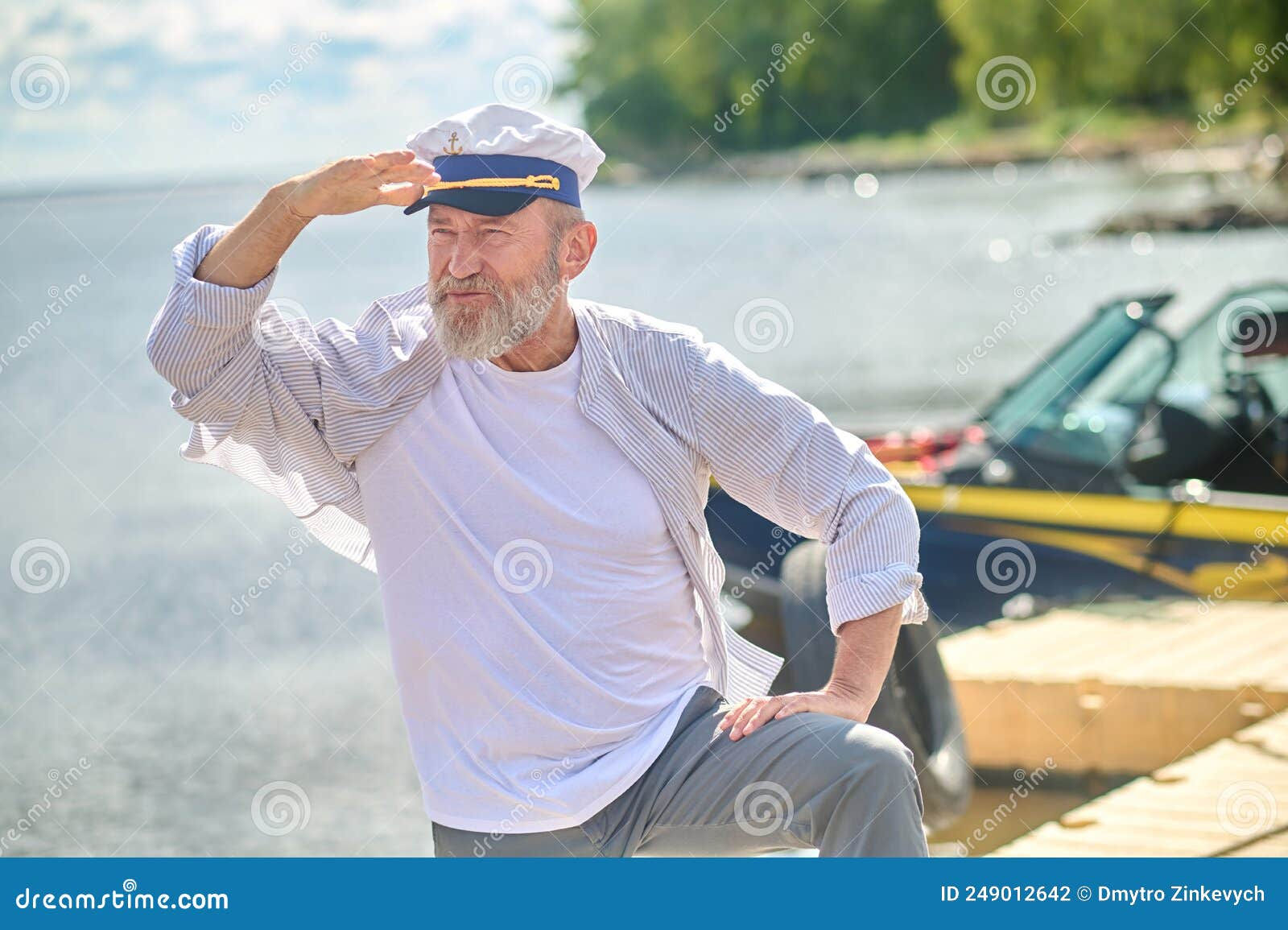 Wallpaper #0jEXNpMB5zzyi_yYPFik97 A Bearded Man in a Captains Cap Looking Contented Stock Photo Image